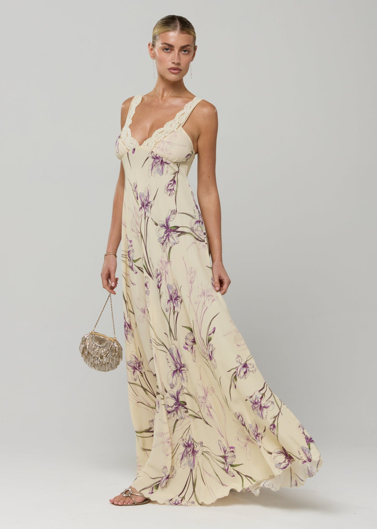 This is an image of Laney Dress in Fern - RESA featuring a model wearing the dress