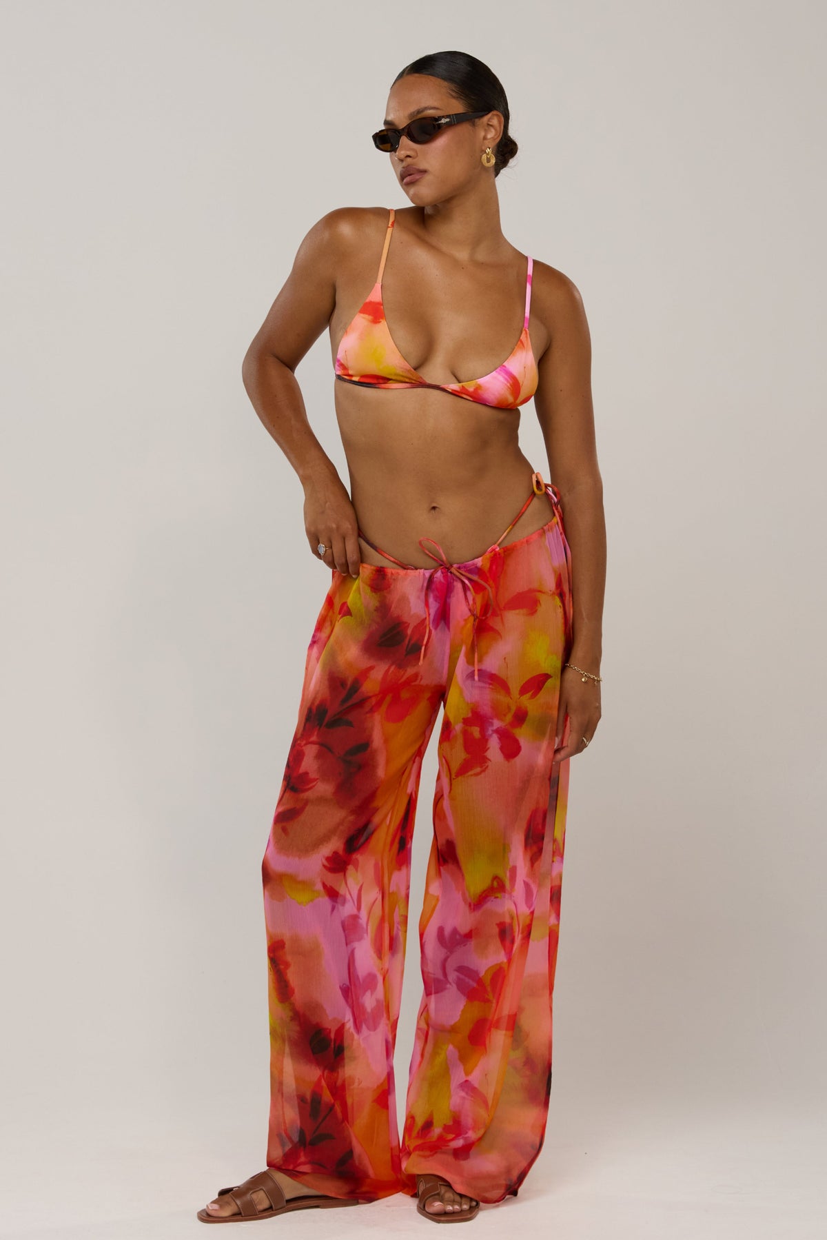 This is an image of Layla in Lilikoi - RESA featuring a model wearing the dress
