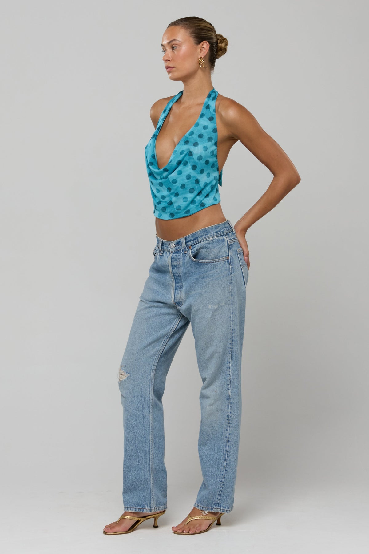 This is an image of Lea in Aquamarine - RESA featuring a model wearing the dress