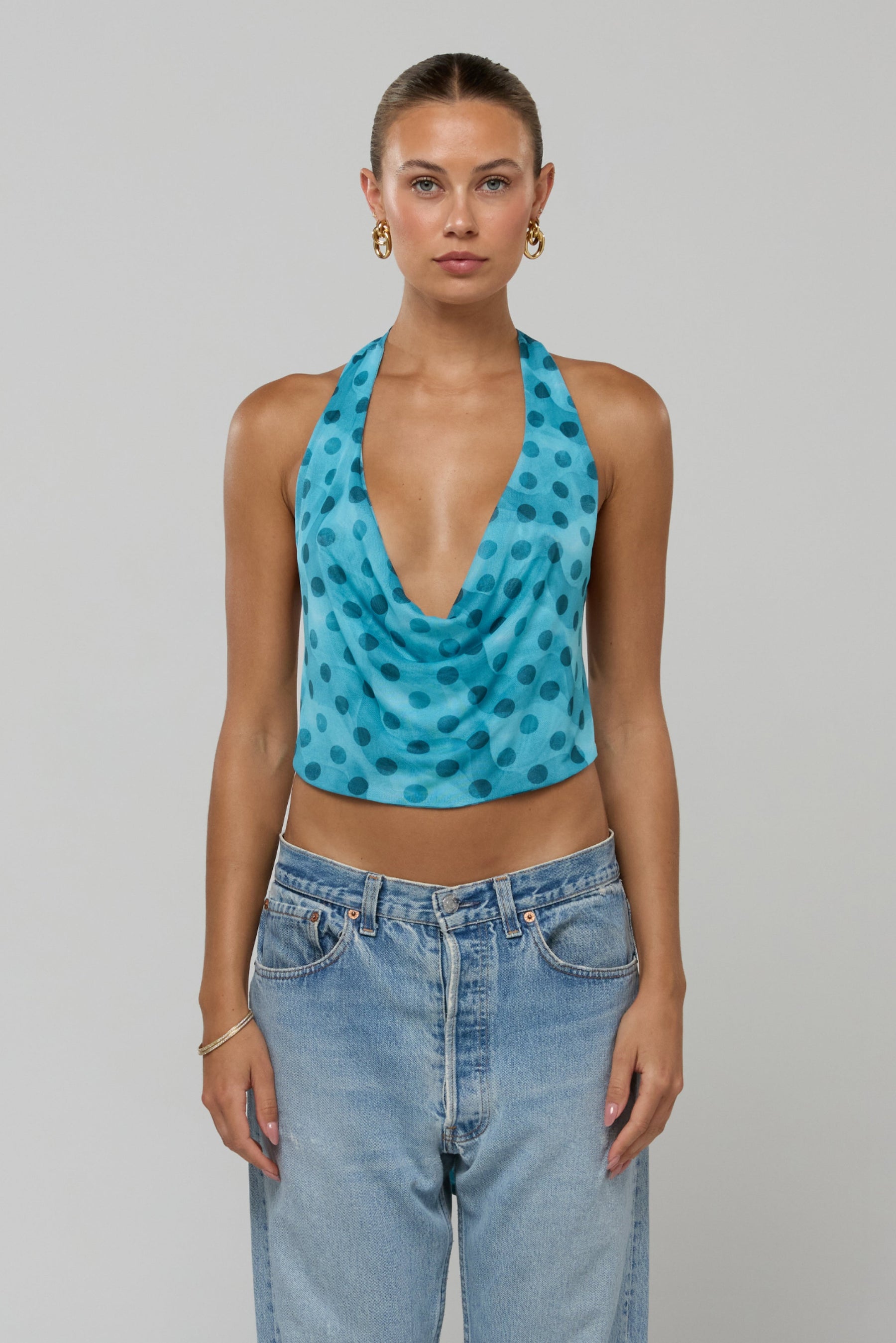 This is an image of Lea in Aquamarine - RESA featuring a model wearing the dress