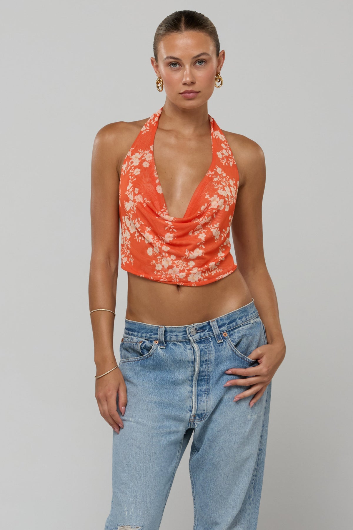This is an image of Lea Top in Orange Blossom - RESA featuring a model wearing the dress