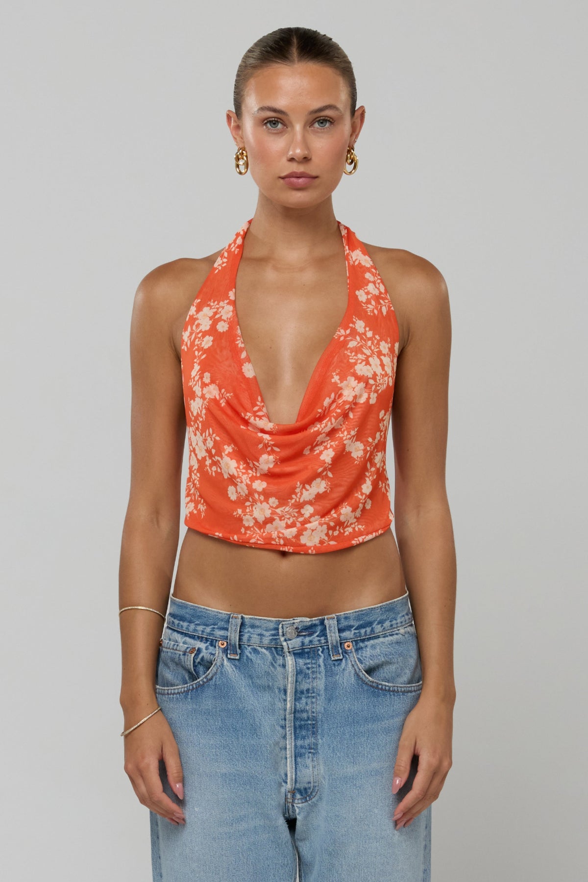 This is an image of Lea Top in Orange Blossom - RESA featuring a model wearing the dress