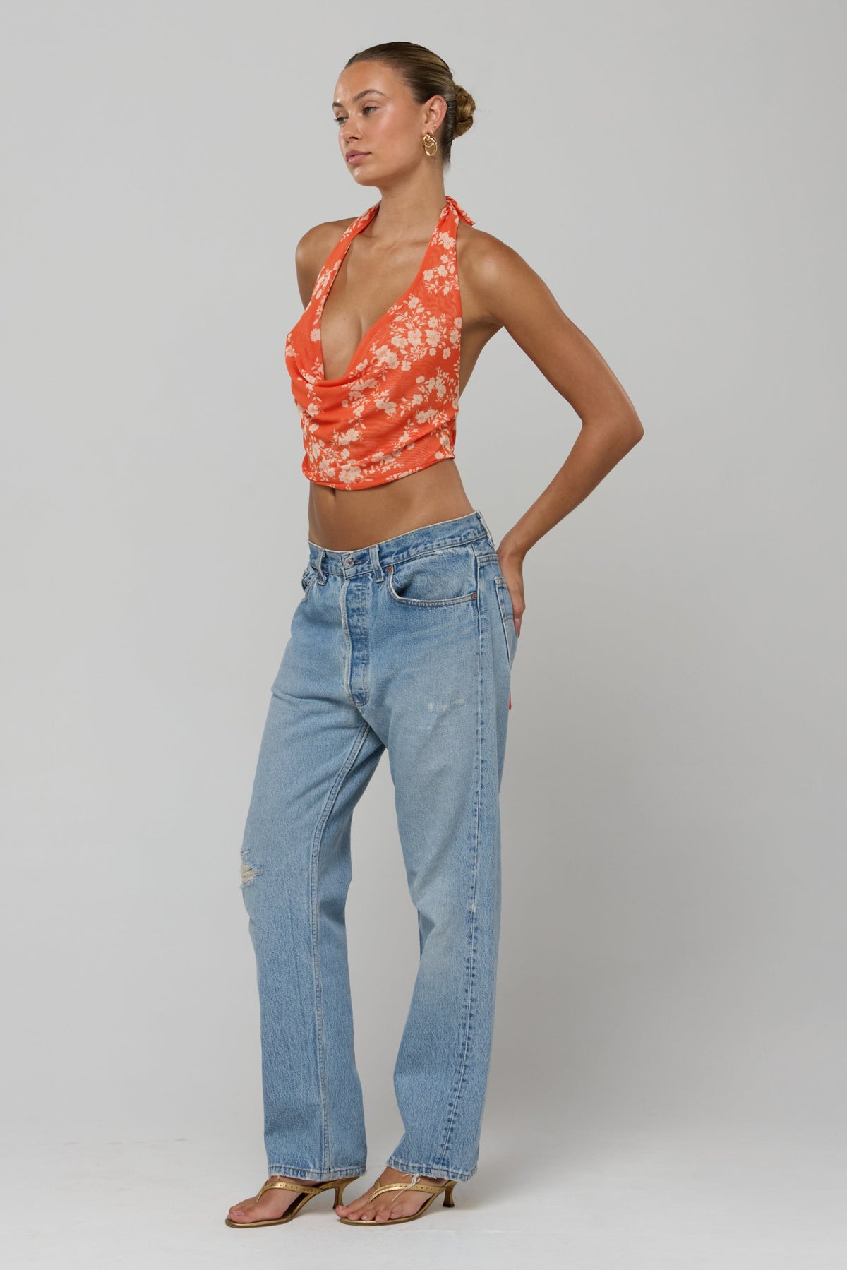 This is an image of Lea Top in Orange Blossom - RESA featuring a model wearing the dress