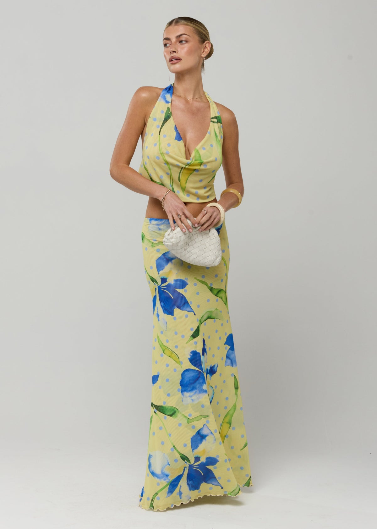 This is an image of Lea Top in Solei - RESA featuring a model wearing the dress