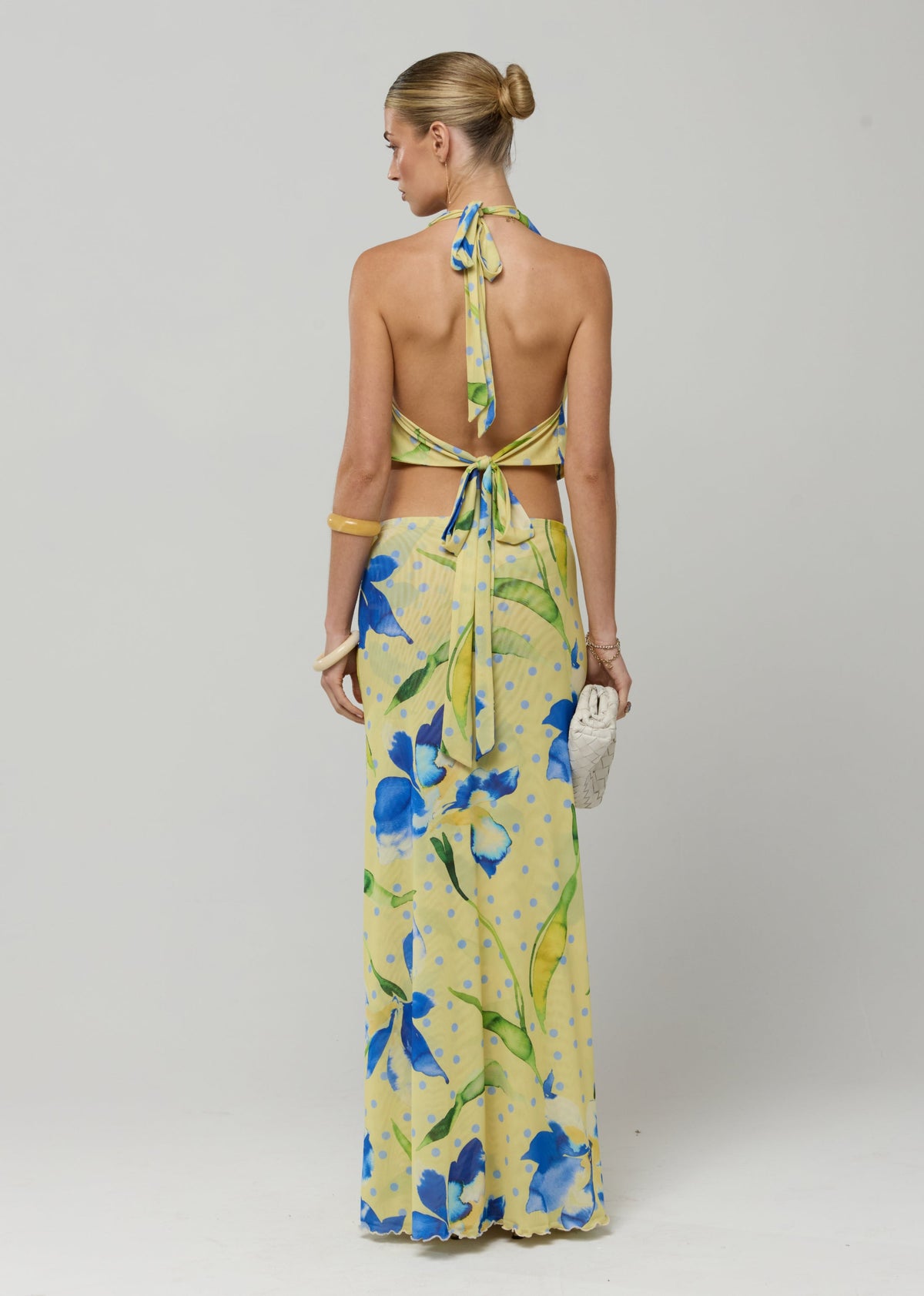 This is an image of Lea Top in Solei - RESA featuring a model wearing the dress