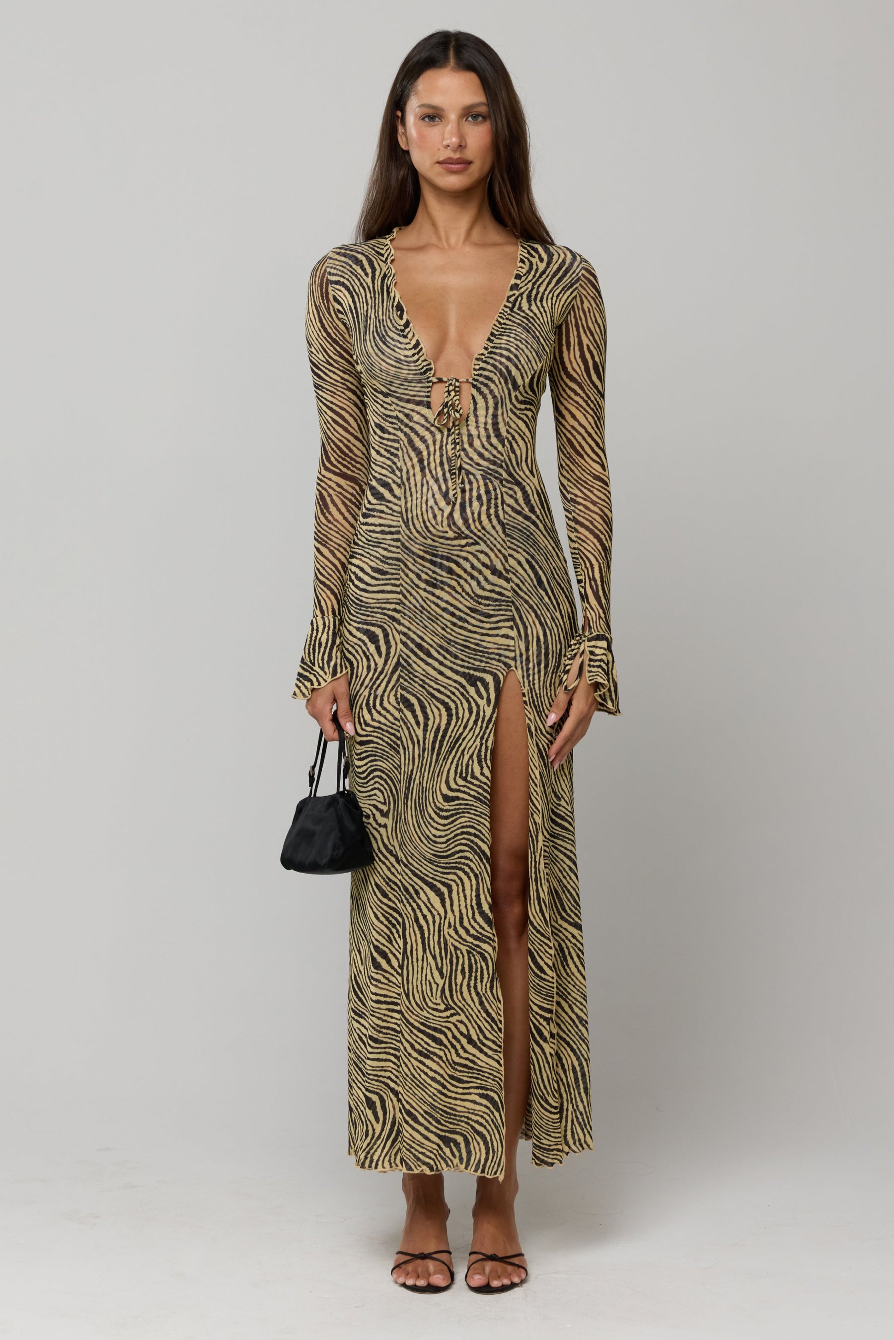 This is an image of Lennon Maxi in Birch - RESA featuring a model wearing the dress