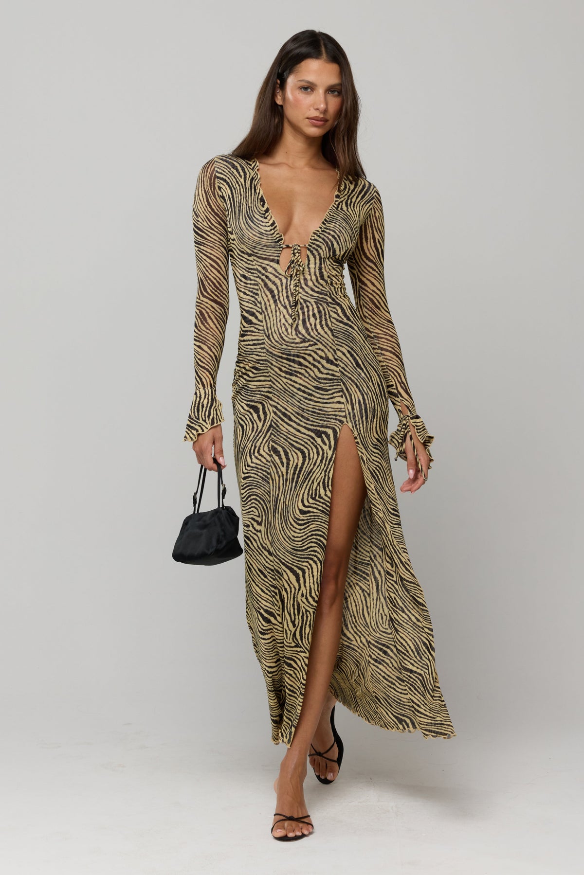This is an image of Lennon Maxi in Birch - RESA featuring a model wearing the dress