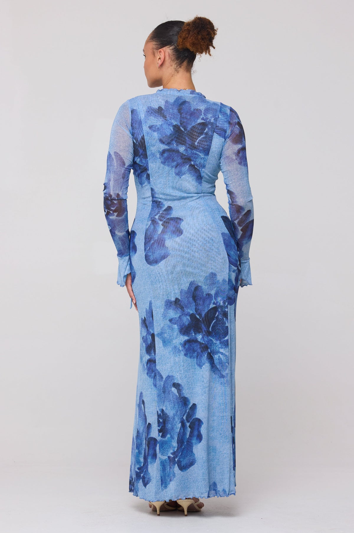 This is an image of Lennon Maxi in Indigo - RESA featuring a model wearing the dress