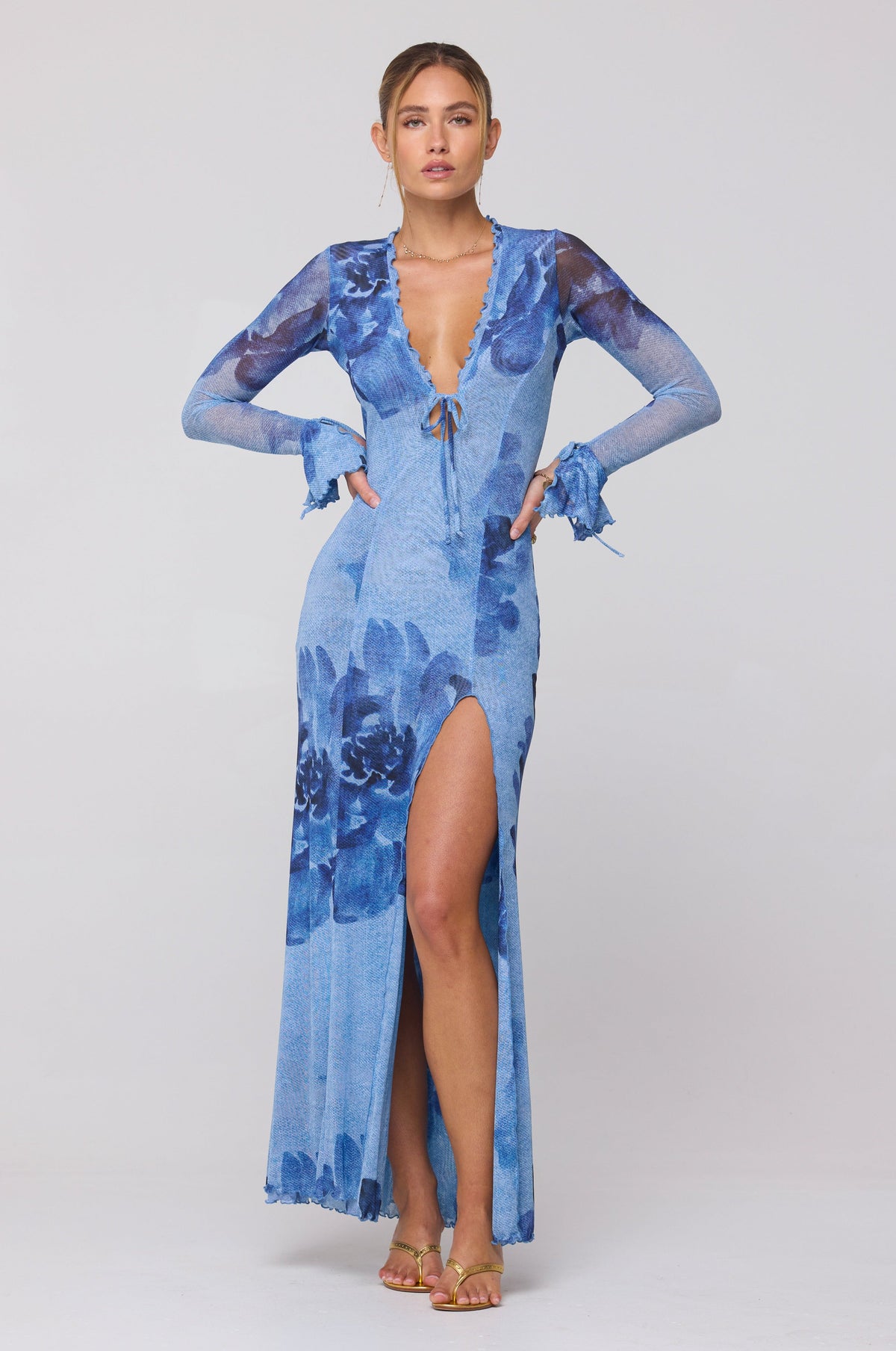 This is an image of Lennon Maxi in Indigo - RESA featuring a model wearing the dress