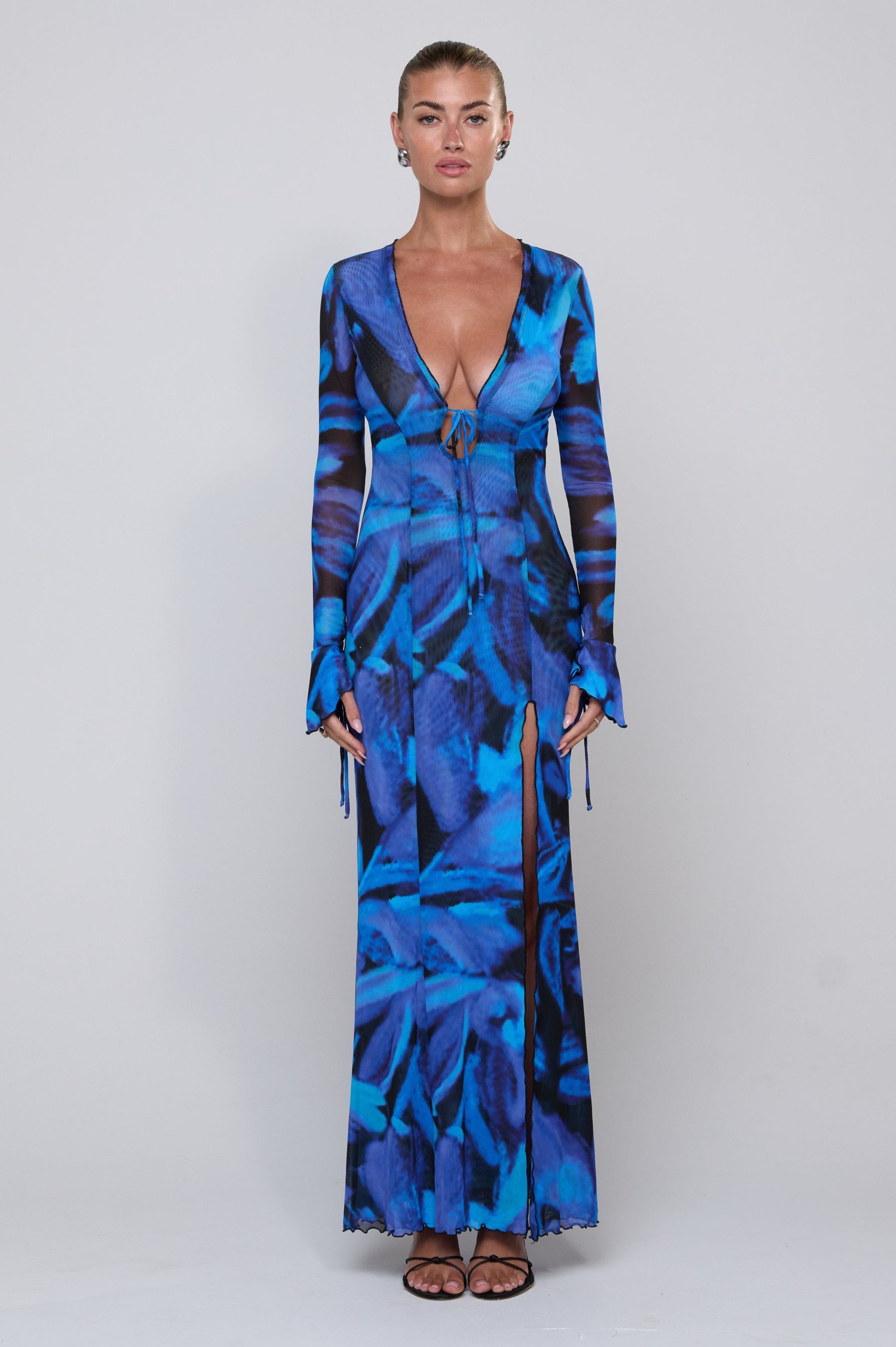 This is an image of Lennon Maxi in Lagoon - RESA featuring a model wearing the dress