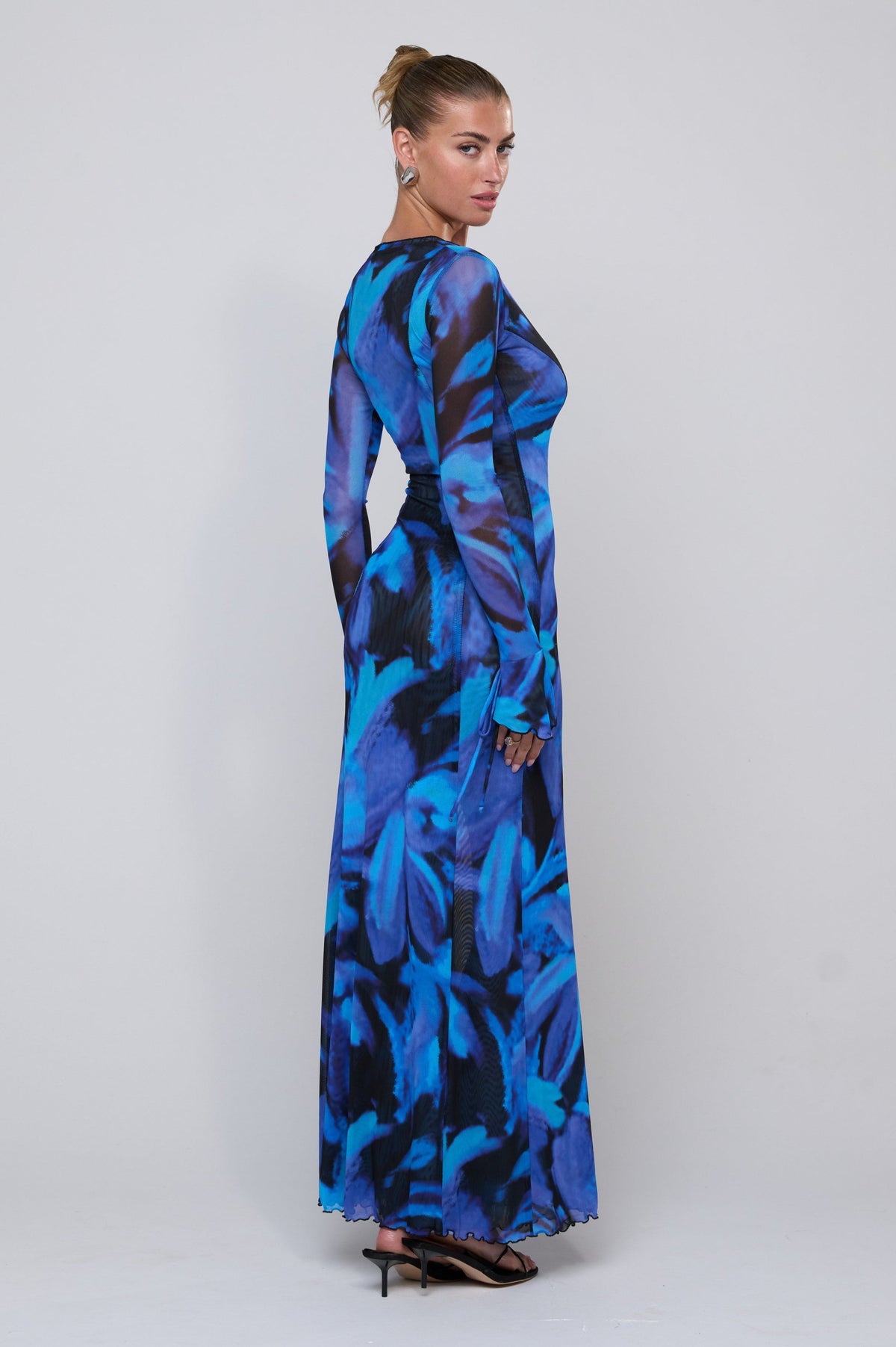 This is an image of Lennon Maxi in Lagoon - RESA featuring a model wearing the dress