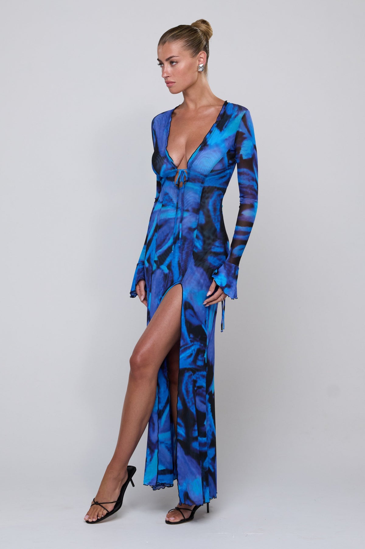 This is an image of Lennon Maxi in Lagoon - RESA featuring a model wearing the dress