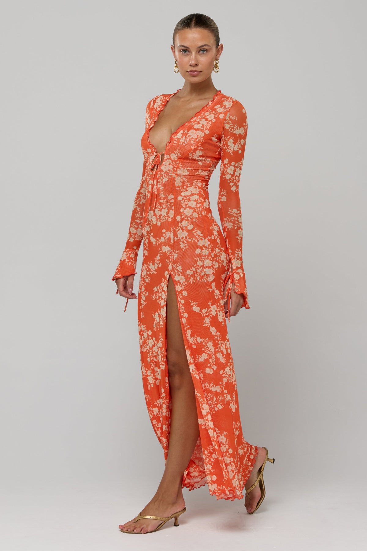 This is an image of Lennon Maxi in Orange Blossom - RESA featuring a model wearing the dress