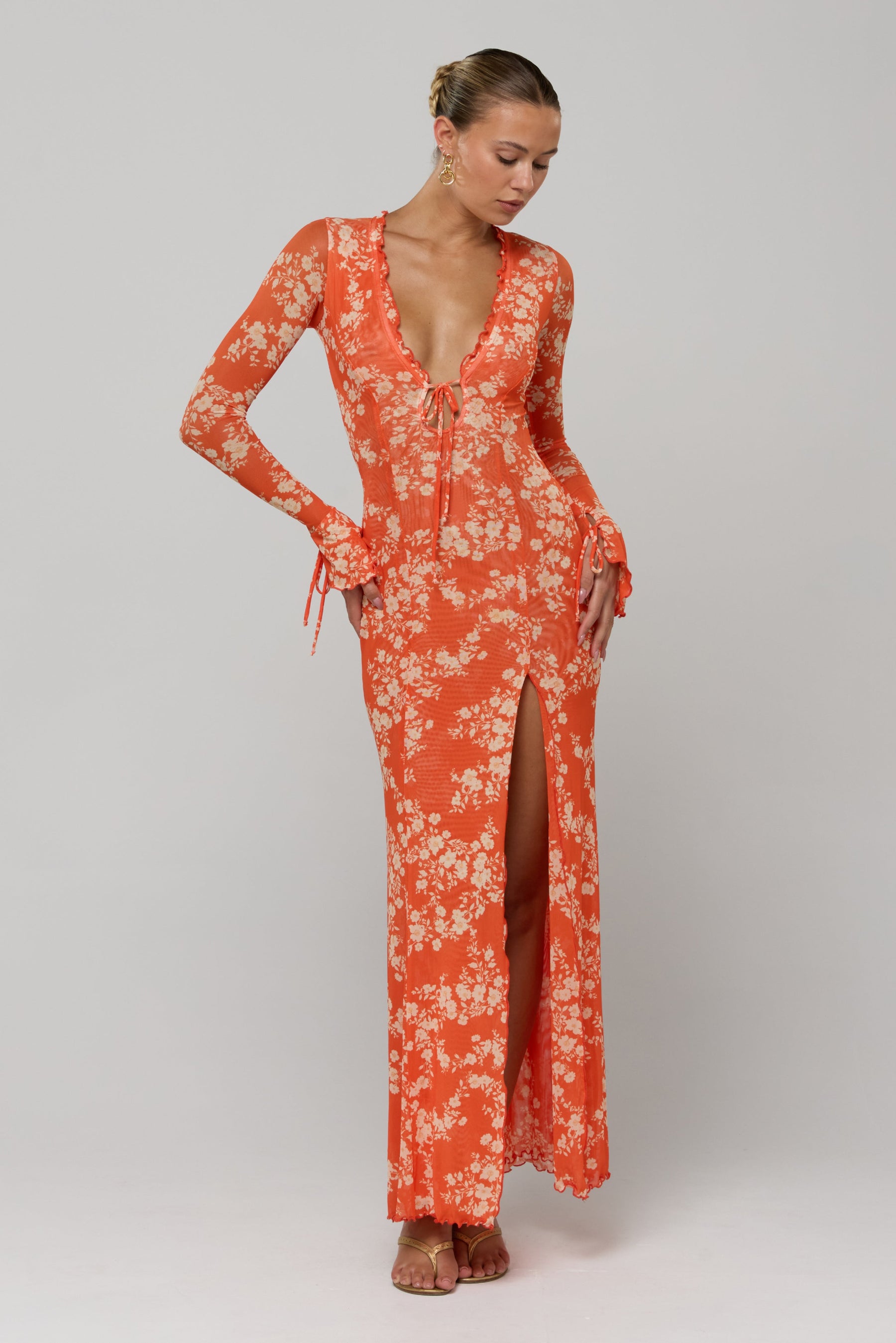 This is an image of Lennon Maxi in Orange Blossom - RESA featuring a model wearing the dress