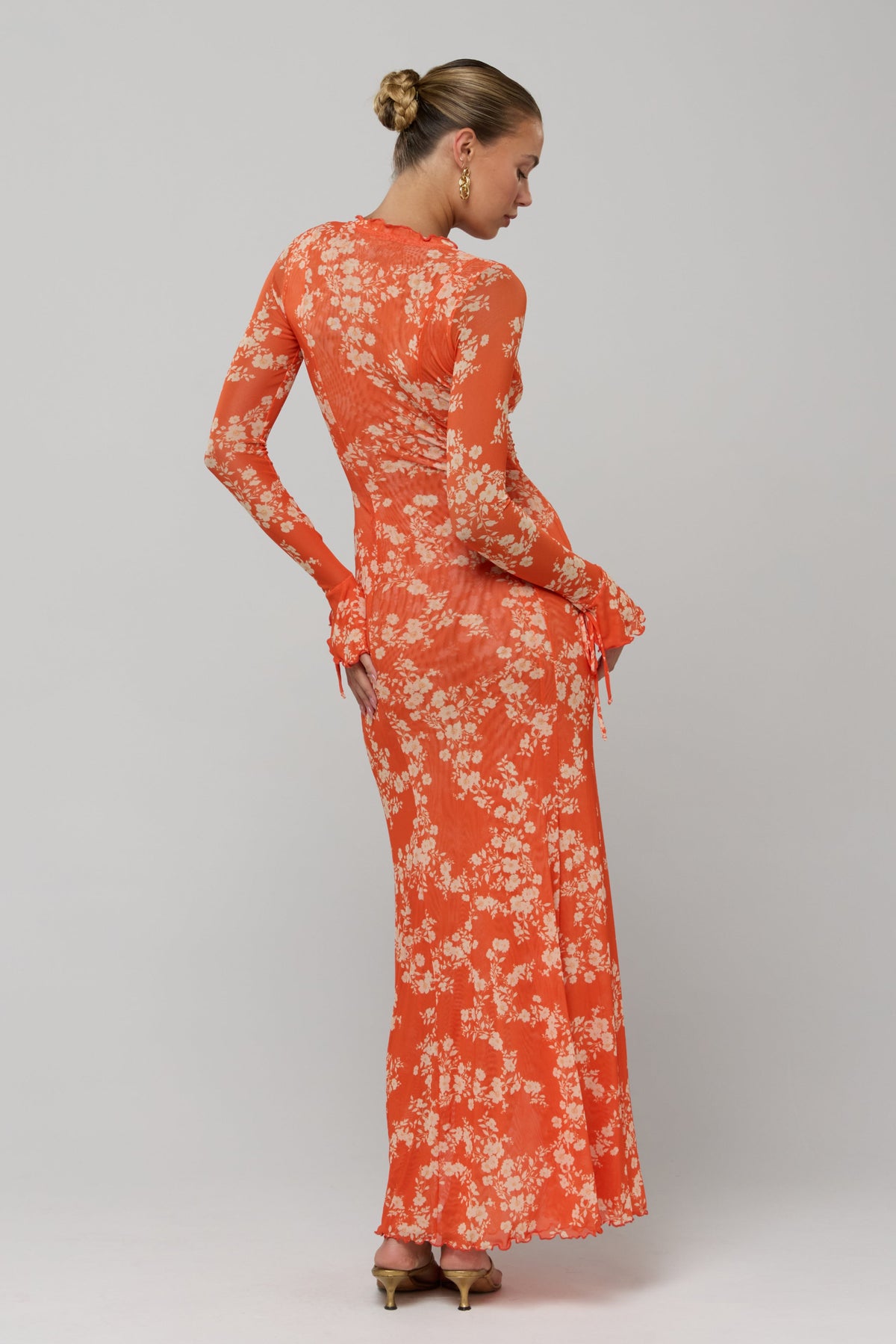 This is an image of Lennon Maxi in Orange Blossom - RESA featuring a model wearing the dress
