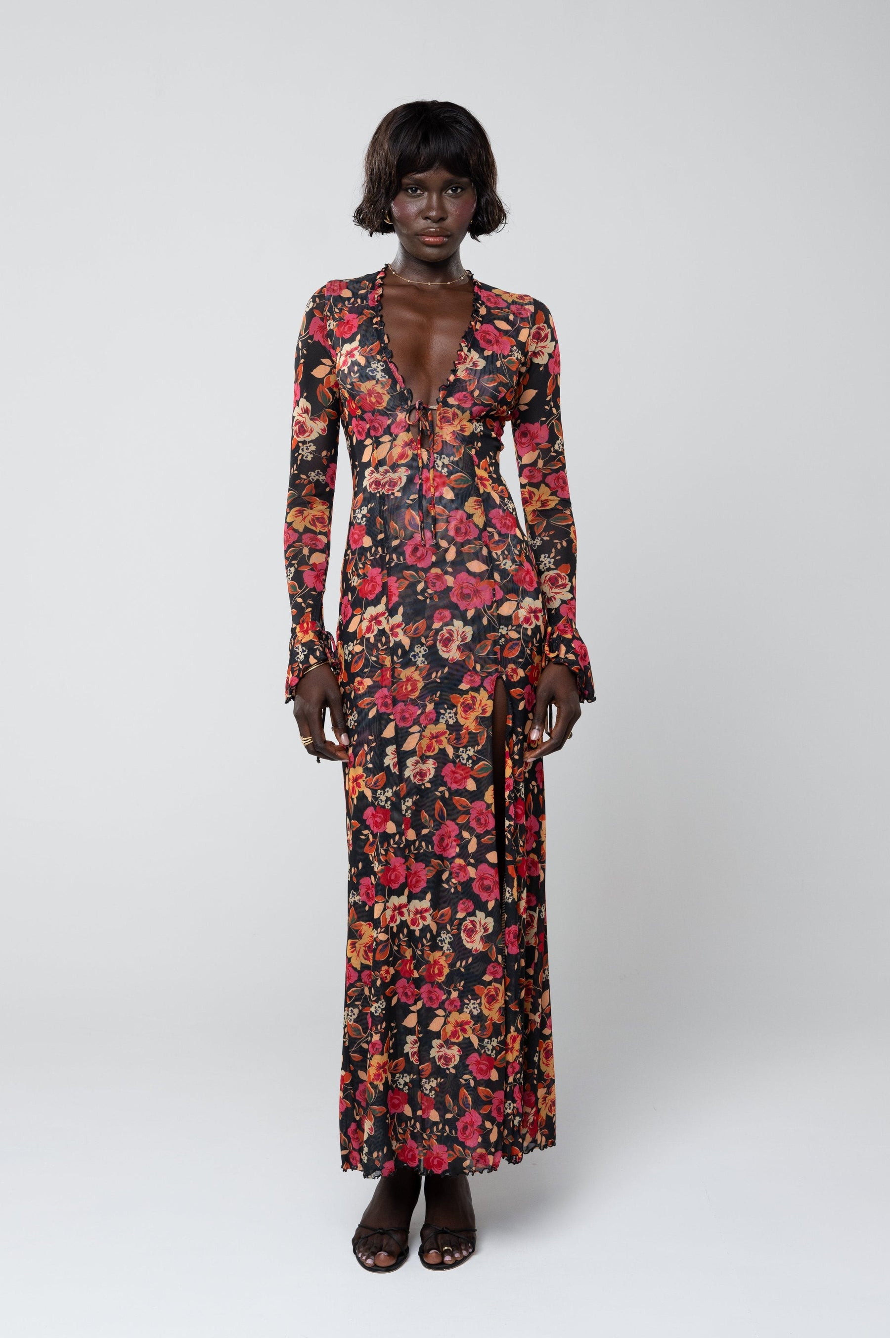 This is an image of Lennon Maxi in Rosie - RESA featuring a model wearing the dress