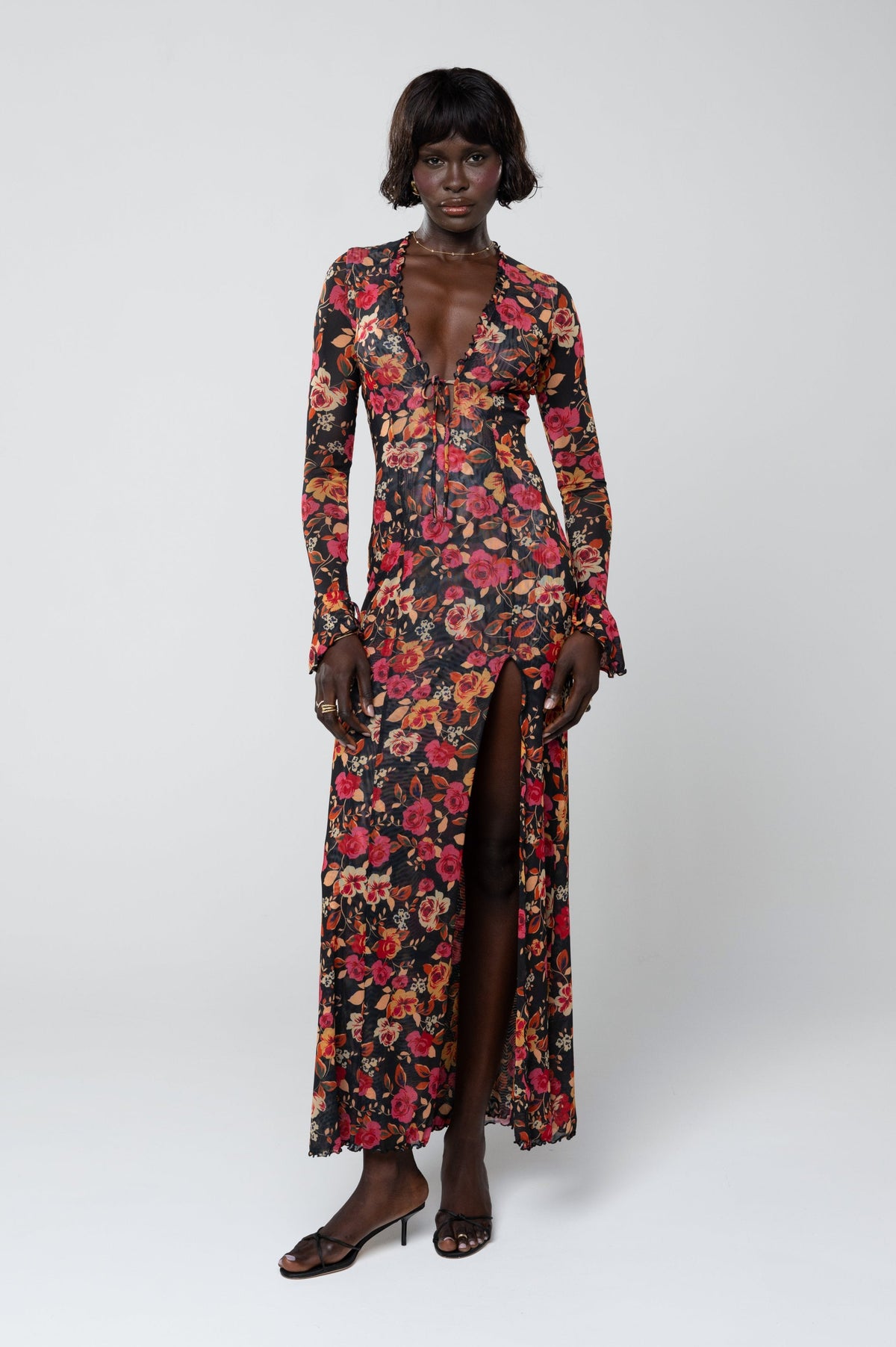 This is an image of Lennon Maxi in Rosie - RESA featuring a model wearing the dress