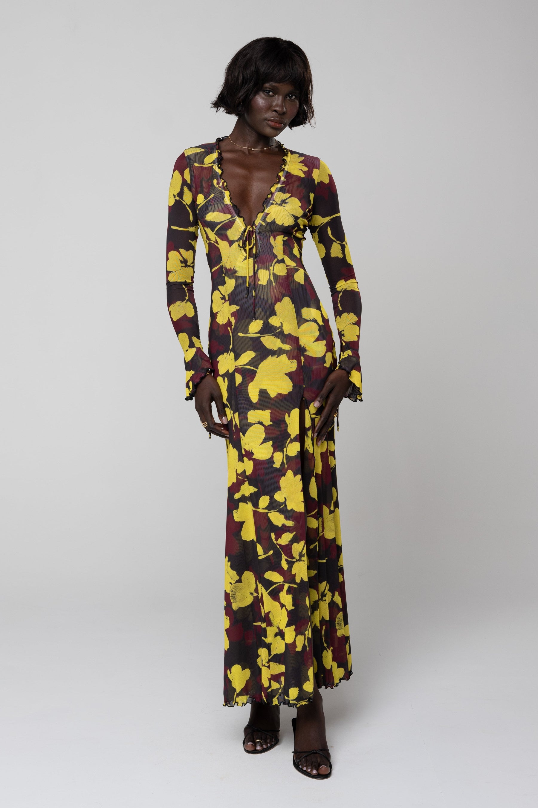 This is an image of Lennon Maxi in Sangria - RESA featuring a model wearing the dress