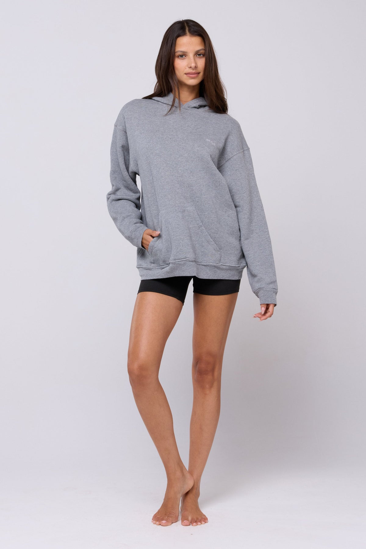 This is an image of Leo Hoodie in Grey - RESA featuring a model wearing the dress