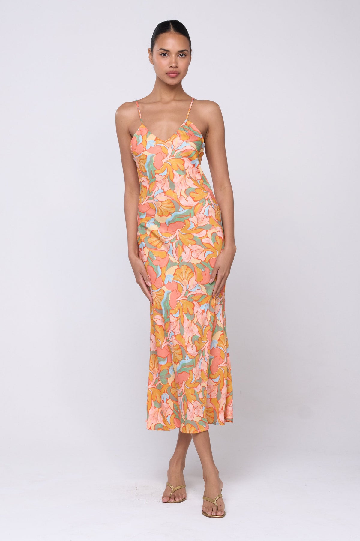 This is an image of Lily Dress in Seychelles - Archive - RESA featuring a model wearing the dress
