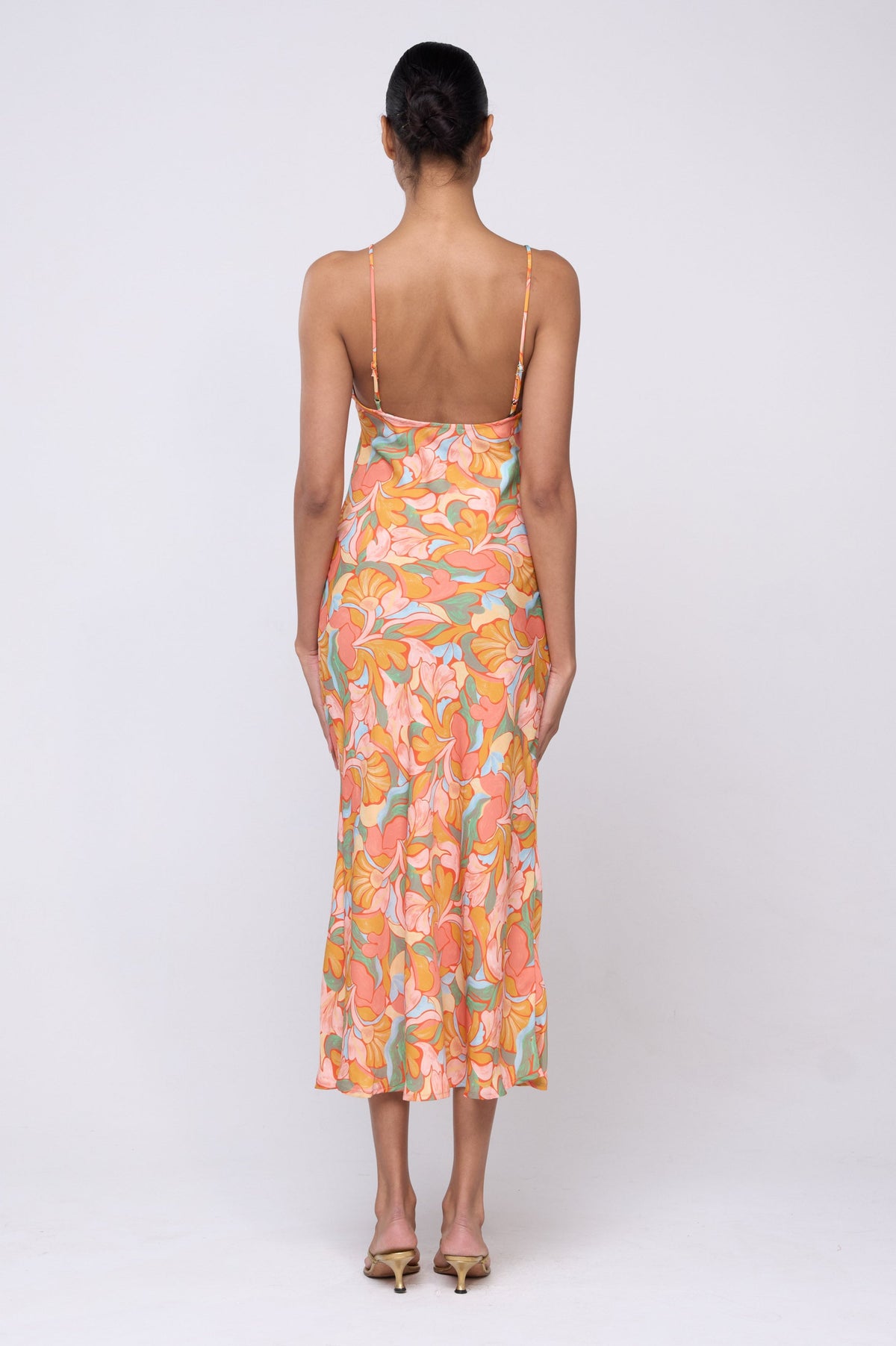 This is an image of Lily Dress in Seychelles - Archive - RESA featuring a model wearing the dress