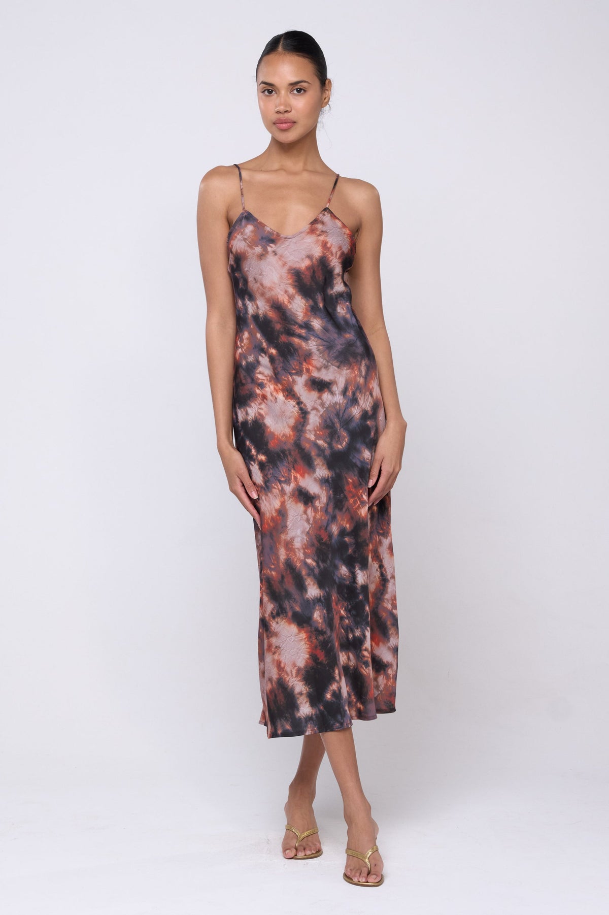 This is an image of Lily Slip in Onyx - Archive - RESA featuring a model wearing the dress