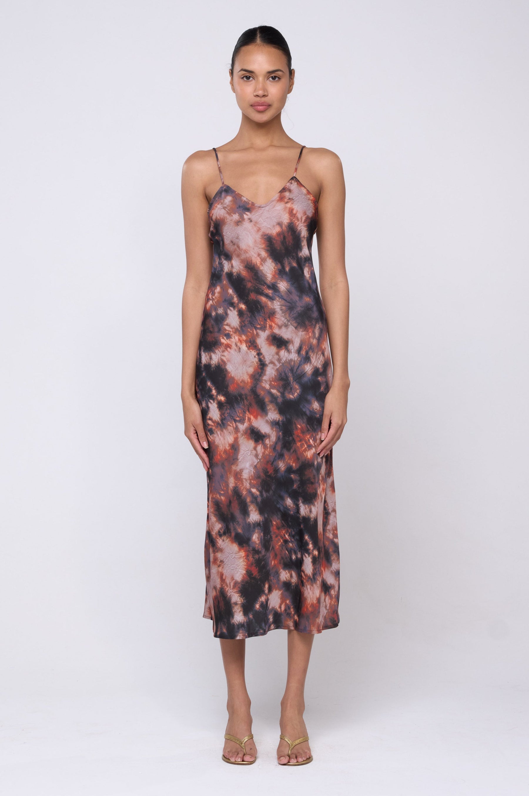 This is an image of Lily Slip in Onyx - Archive - RESA featuring a model wearing the dress