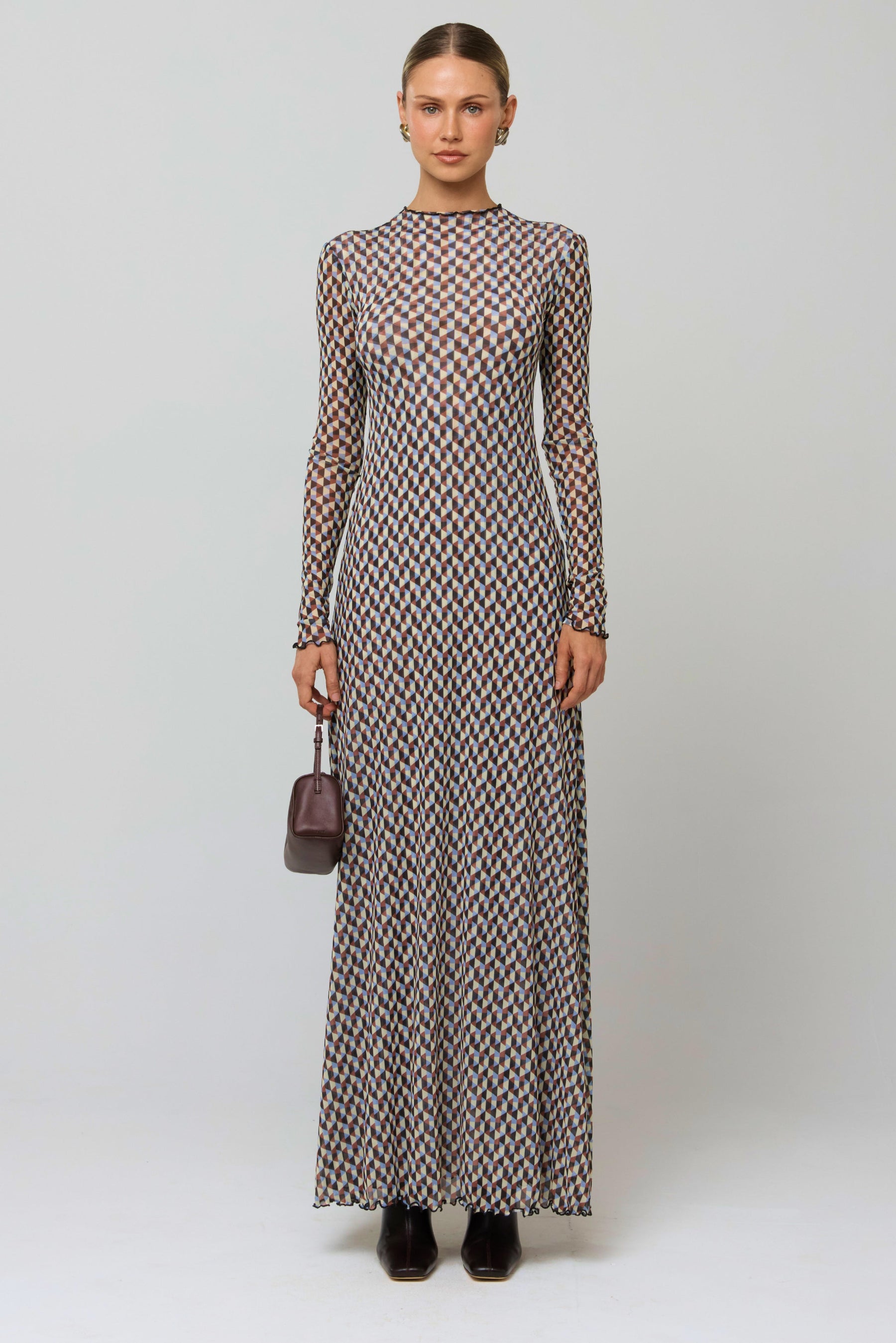 This is an image of Lyon Dress in Mosaic - RESA featuring a model wearing the dress