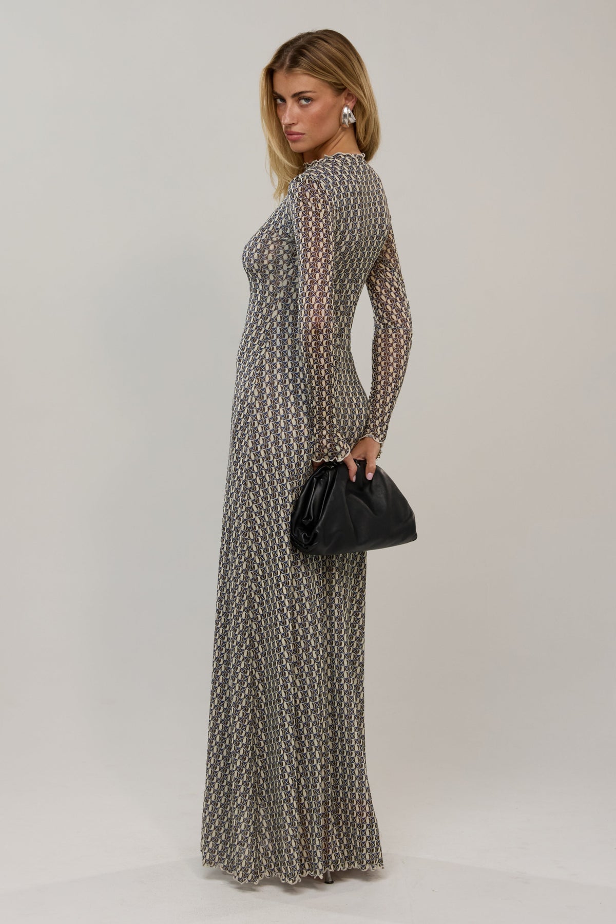 This is an image of Lyon in Prism - RESA featuring a model wearing the dress