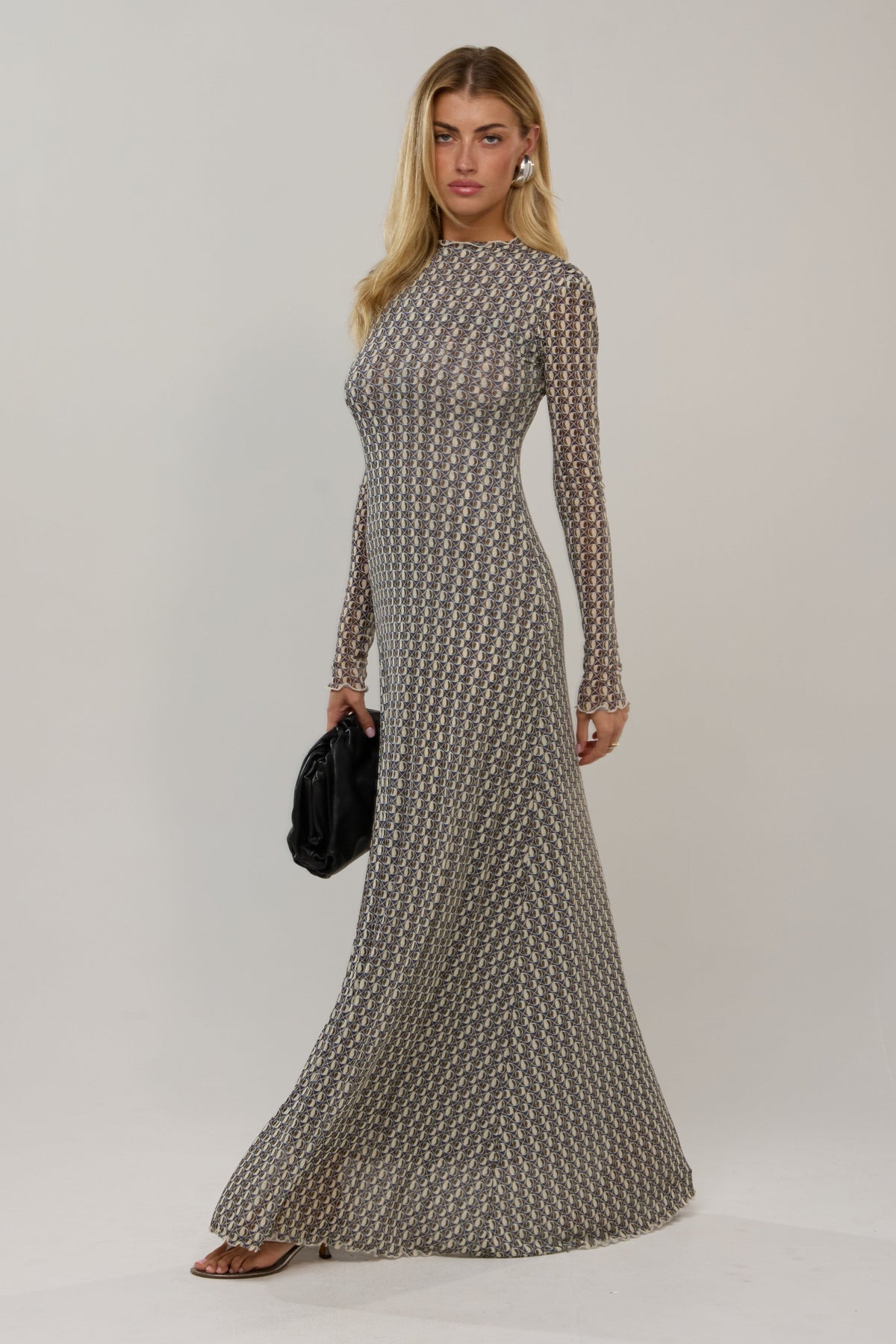 This is an image of Lyon in Prism - RESA featuring a model wearing the dress