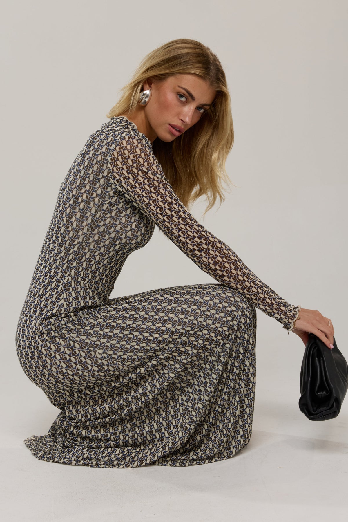 This is an image of Lyon in Prism - RESA featuring a model wearing the dress