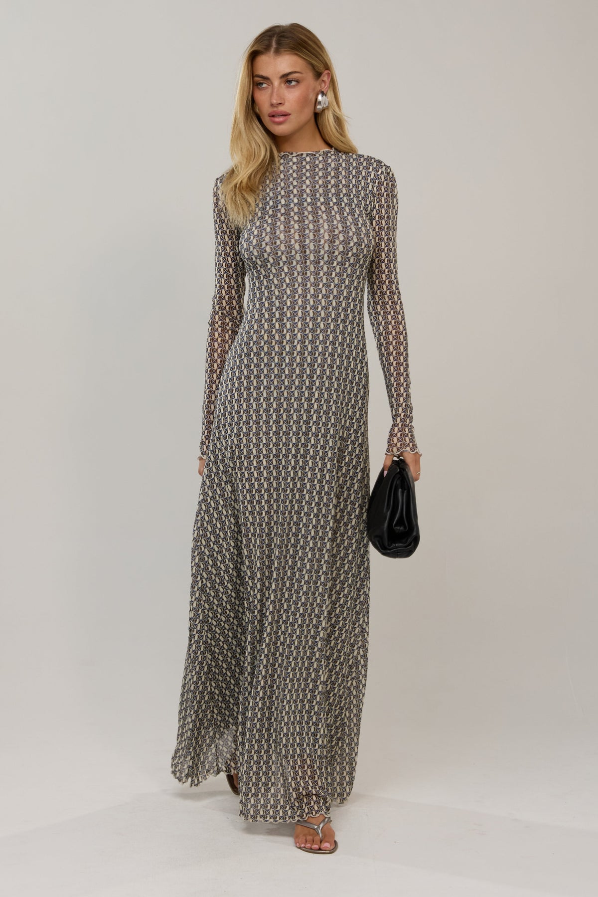 This is an image of Lyon in Prism - RESA featuring a model wearing the dress