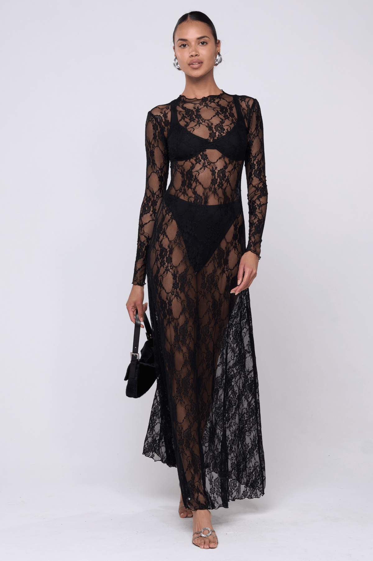 This is an image of Lyon Lace Dress in Black Lace - RESA featuring a model wearing the dress