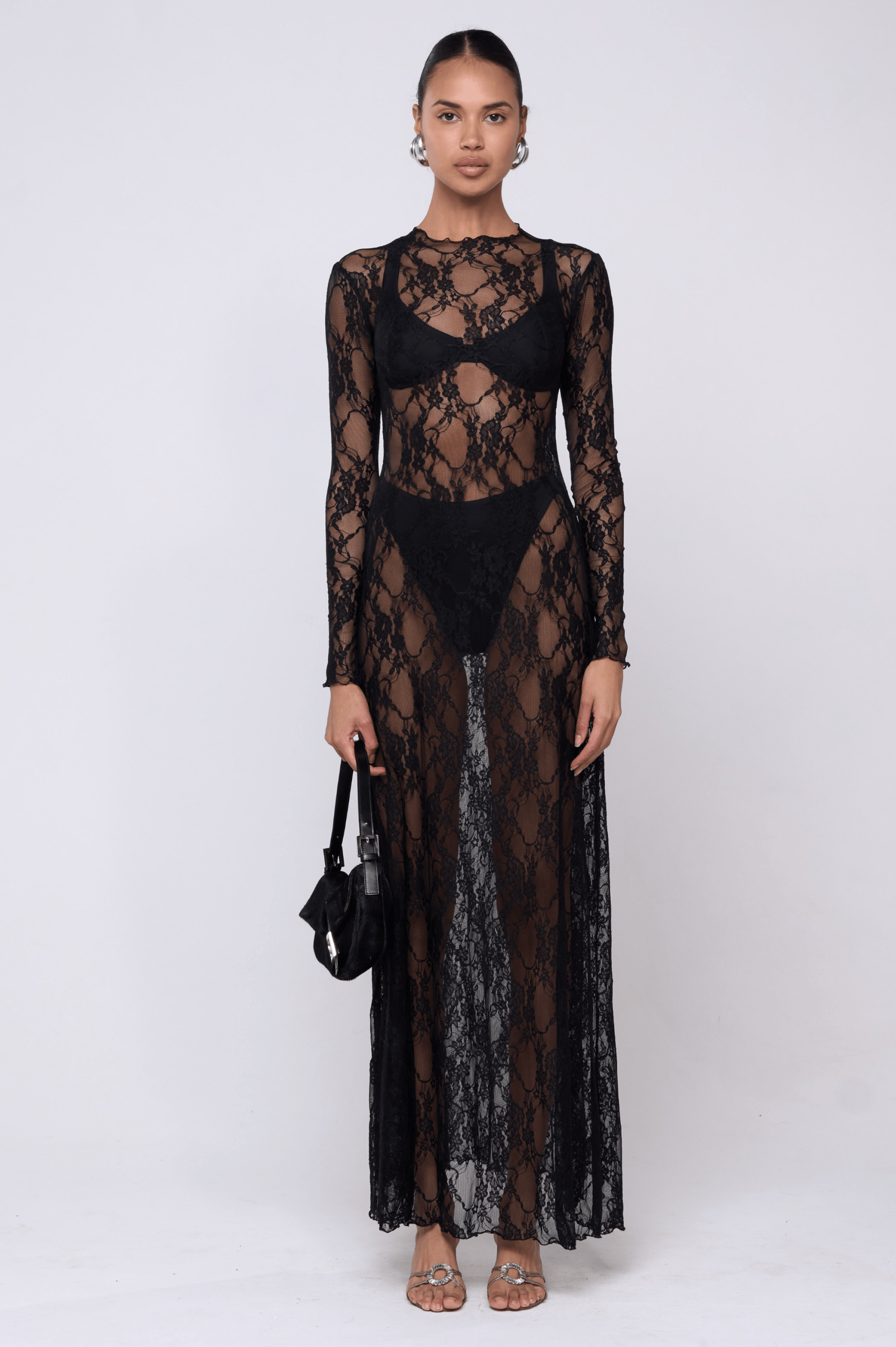 This is an image of Lyon Lace Dress in Black Lace - RESA featuring a model wearing the dress