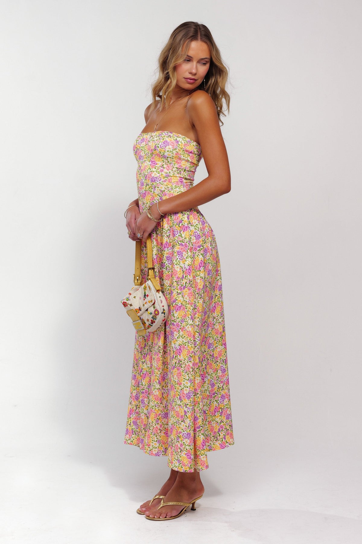 This is an image of Mackenzie Dress in April - RESA featuring a model wearing the dress
