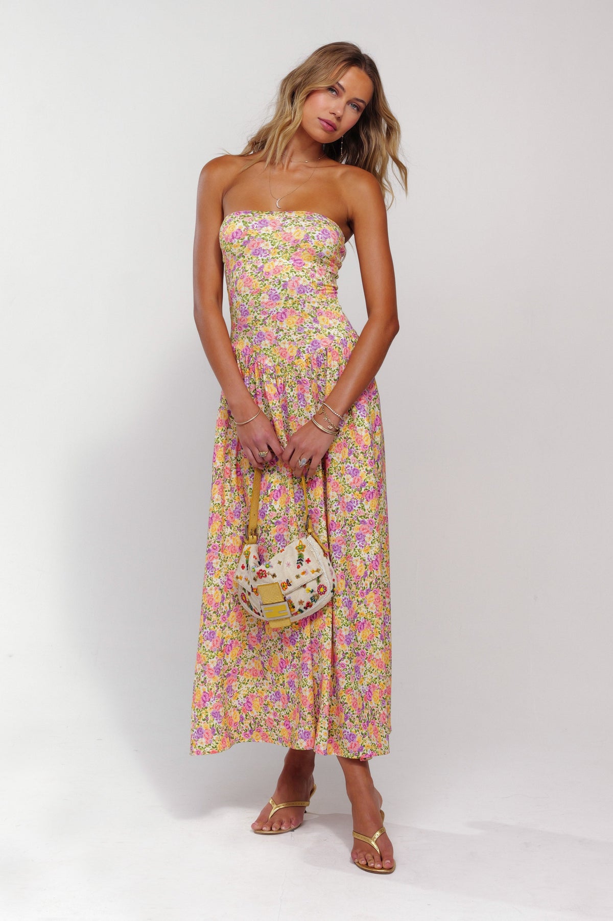 This is an image of Mackenzie Dress in April - RESA featuring a model wearing the dress