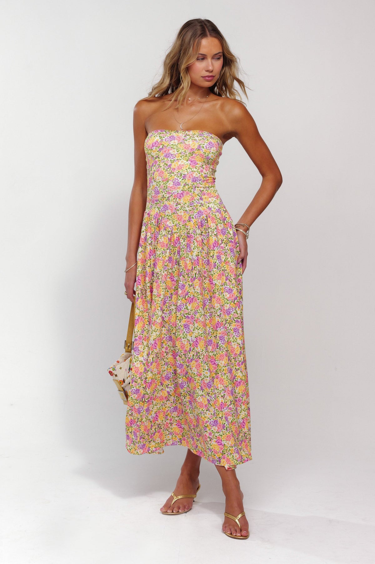 This is an image of Mackenzie Dress in April - RESA featuring a model wearing the dress