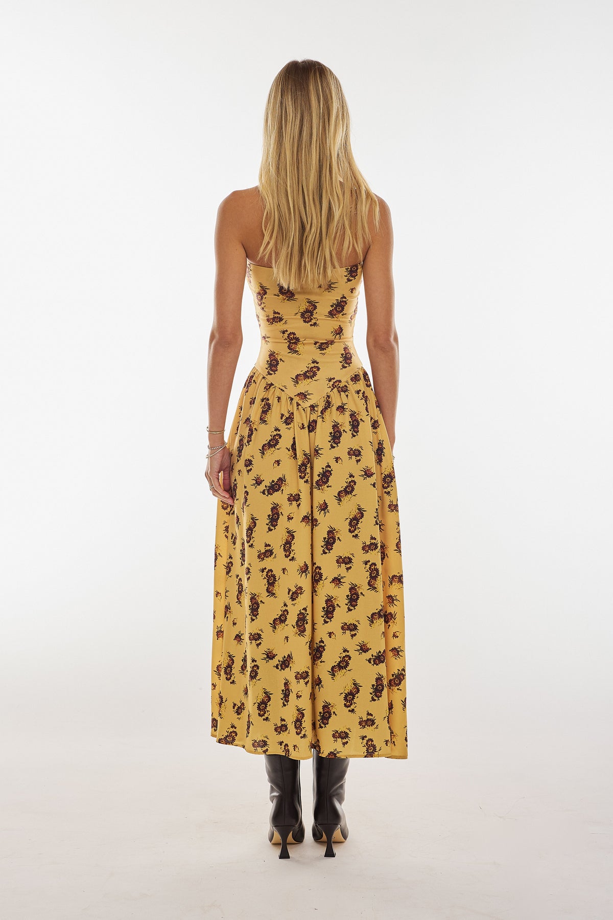 This is an image of Mackenzie Dress in Dandelion - RESA featuring a model wearing the dress