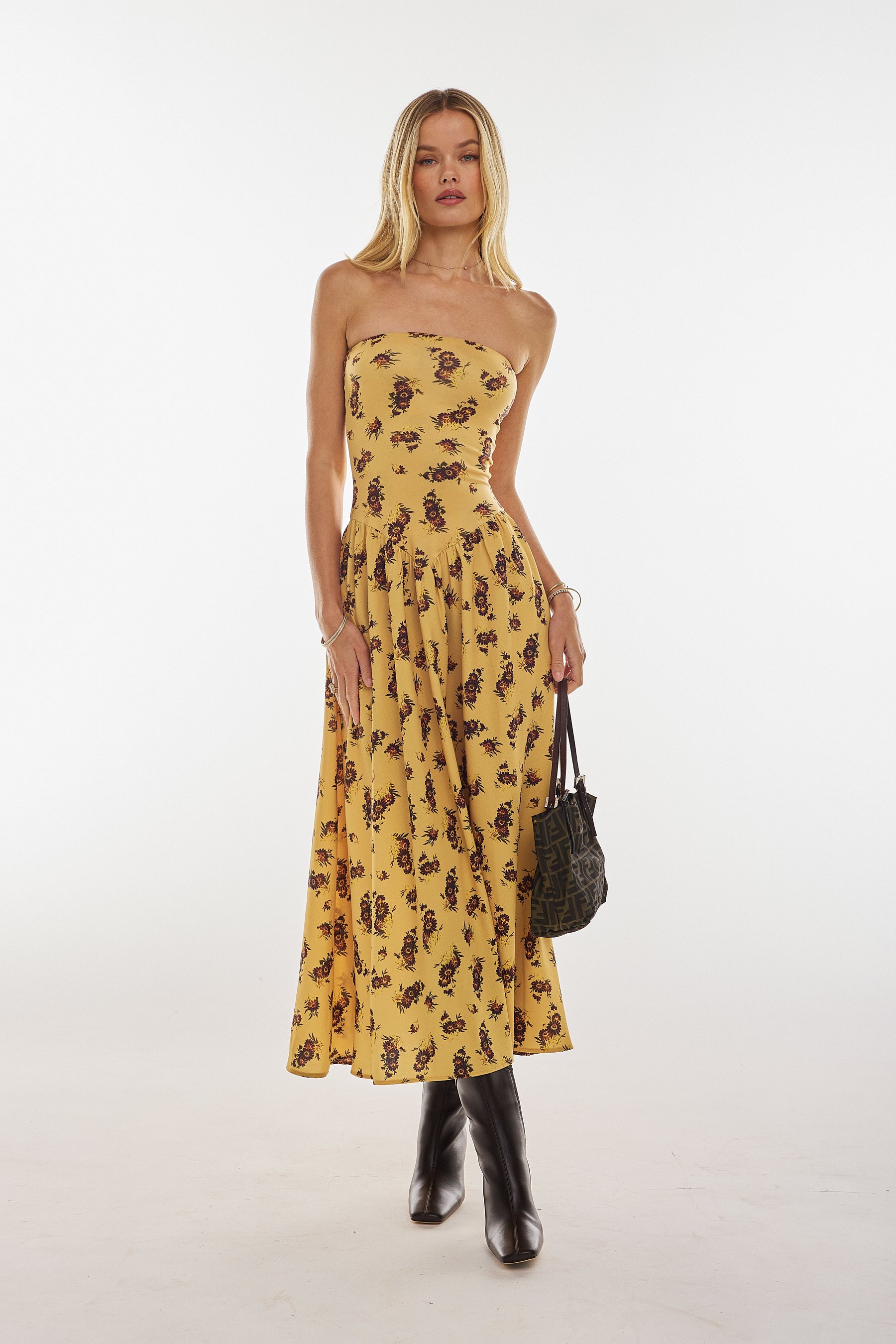 This is an image of Mackenzie Dress in Dandelion - RESA featuring a model wearing the dress