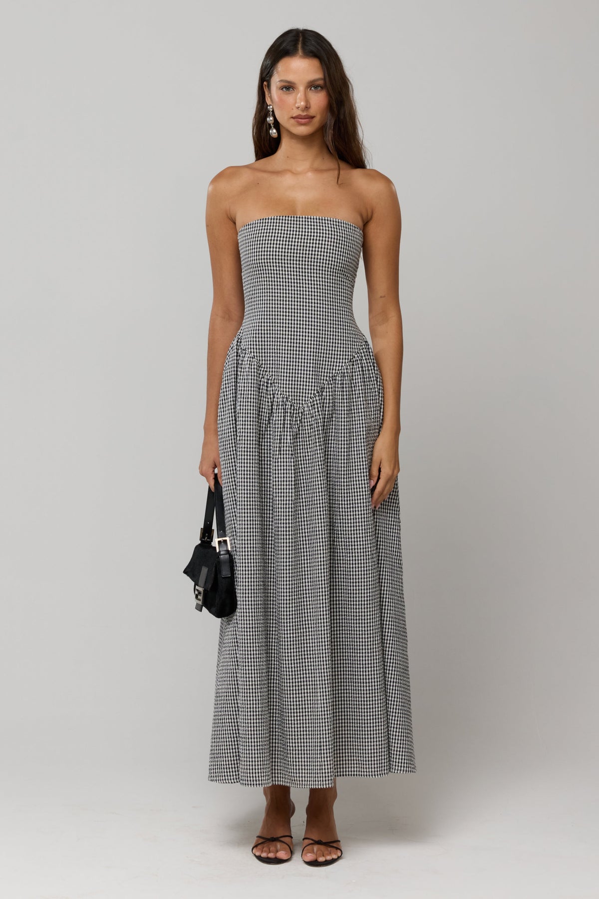 This is an image of Mackenzie Dress in Hampton - RESA featuring a model wearing the dress