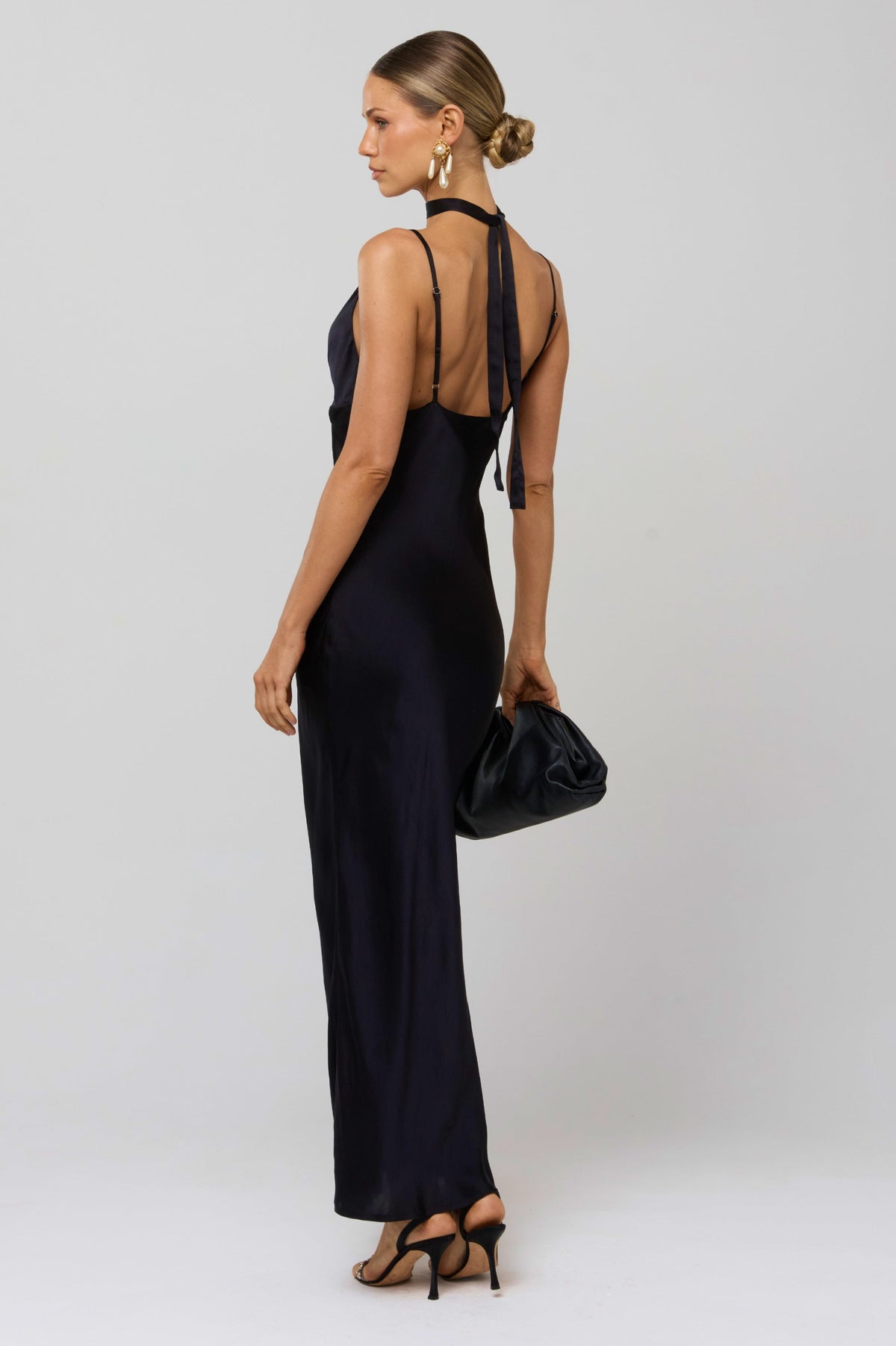 This is an image of Madeline Dress in Black - RESA featuring a model wearing the dress