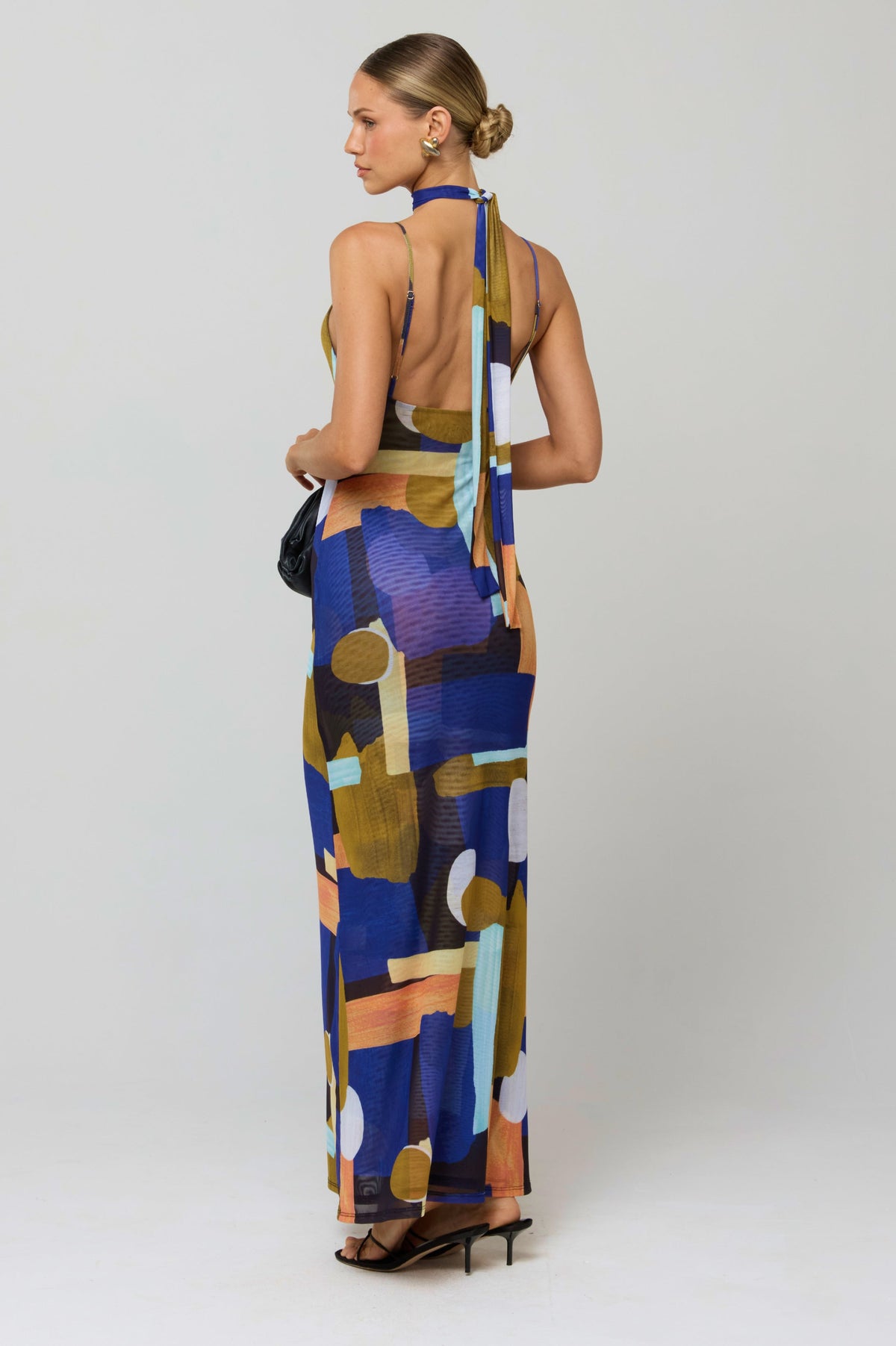 This is an image of Madeline Dress in Deco - RESA featuring a model wearing the dress