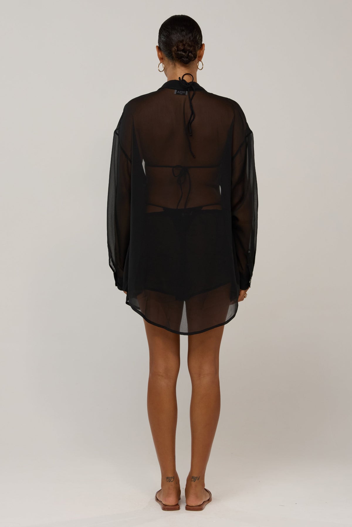 This is an image of Maggie in Black Chiffon - RESA featuring a model wearing the dress