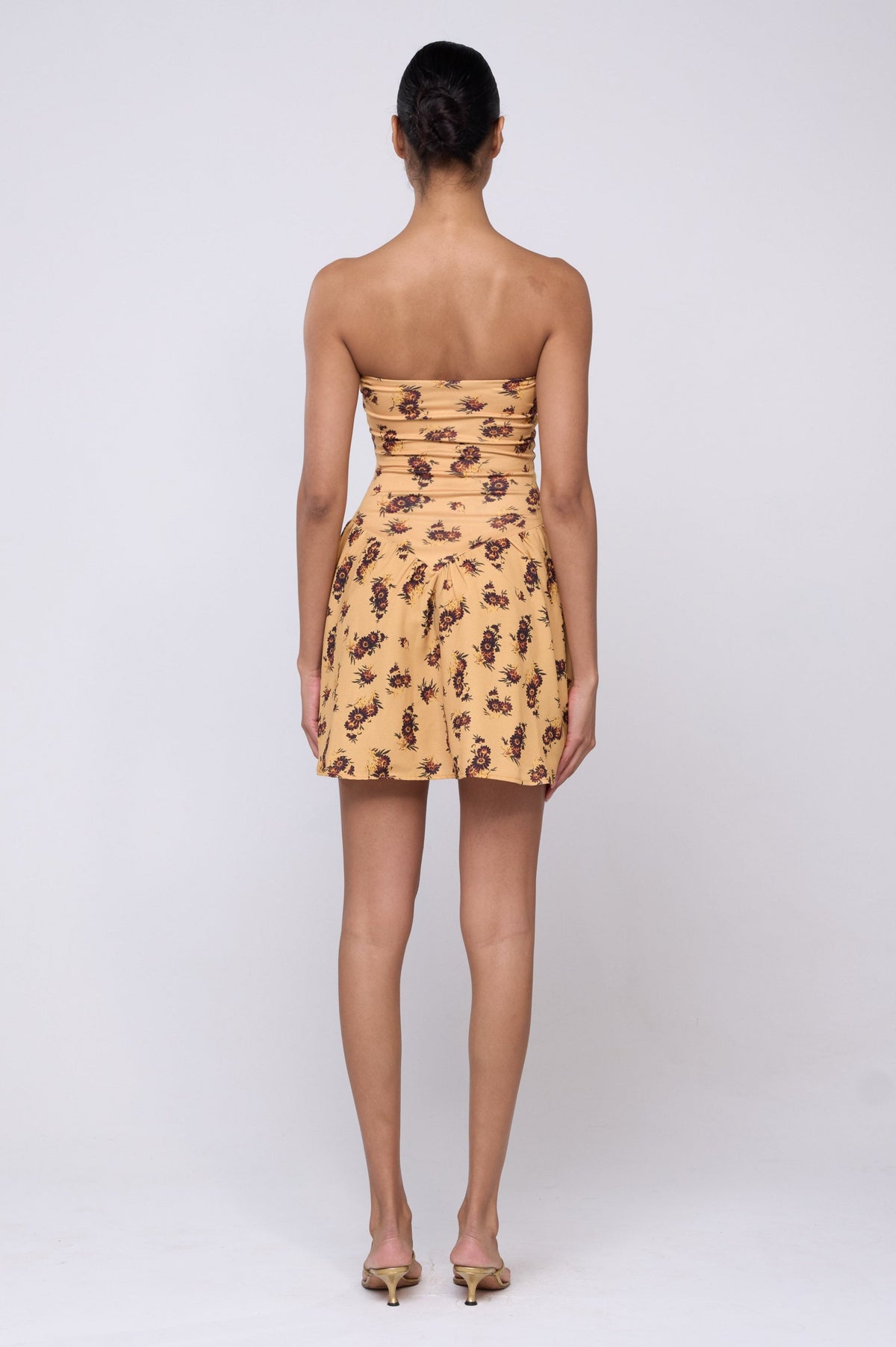 This is an image of Makie Dress in Dandelion - Archive - RESA featuring a model wearing the dress
