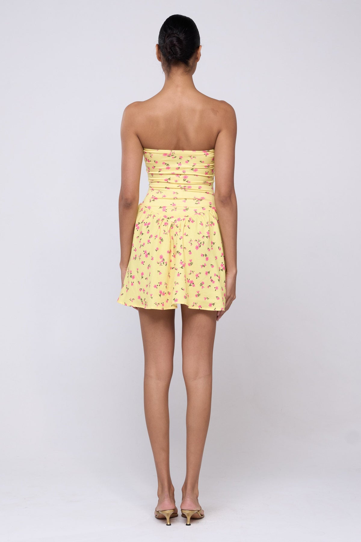 This is an image of Makie Dress in Honey - Archive - RESA featuring a model wearing the dress