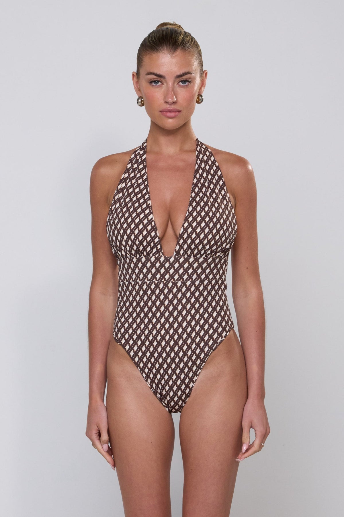 This is an image of Malia One Piece in Tulum - RESA featuring a model wearing the dress