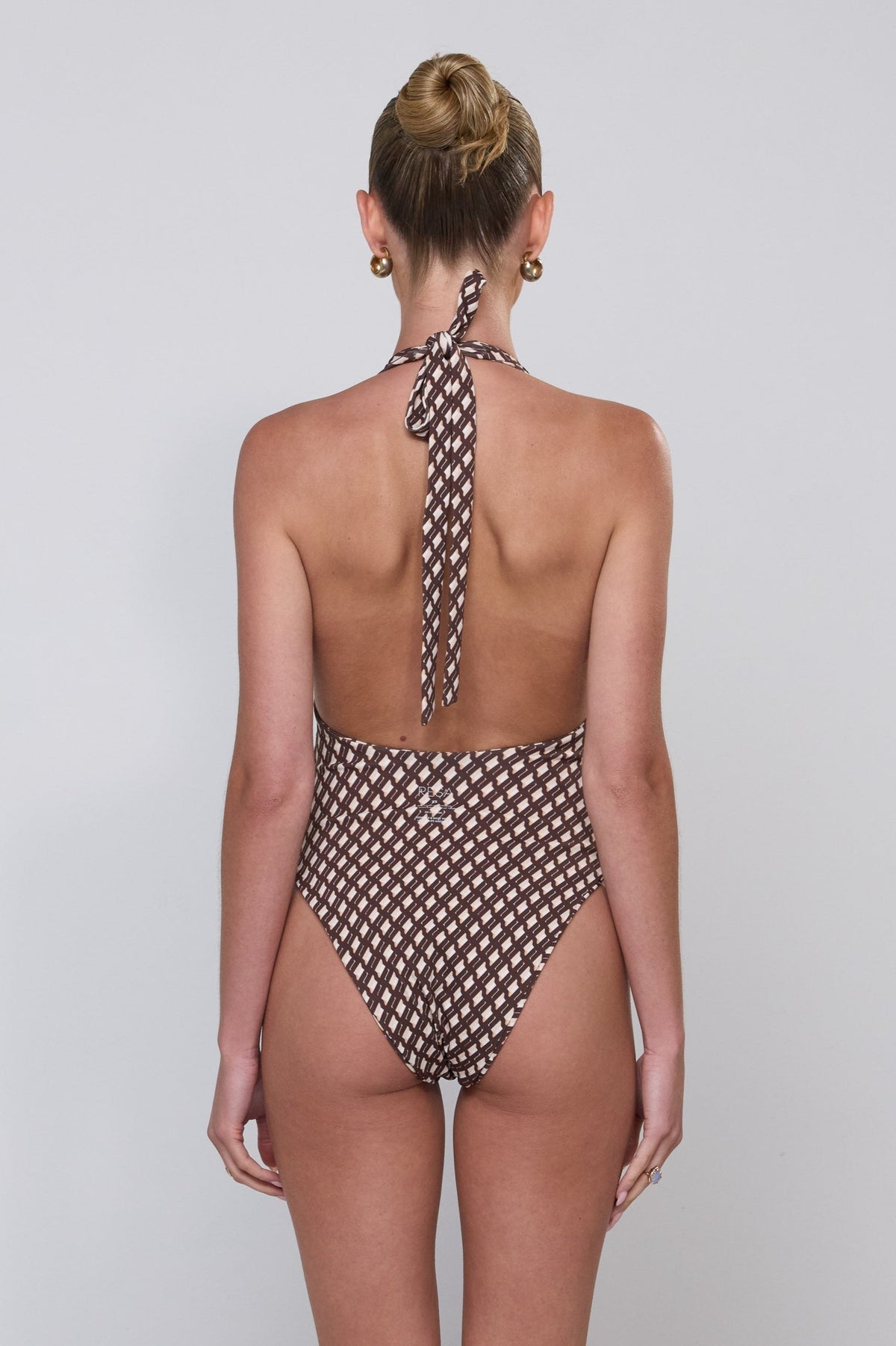 This is an image of Malia One Piece in Tulum - RESA featuring a model wearing the dress