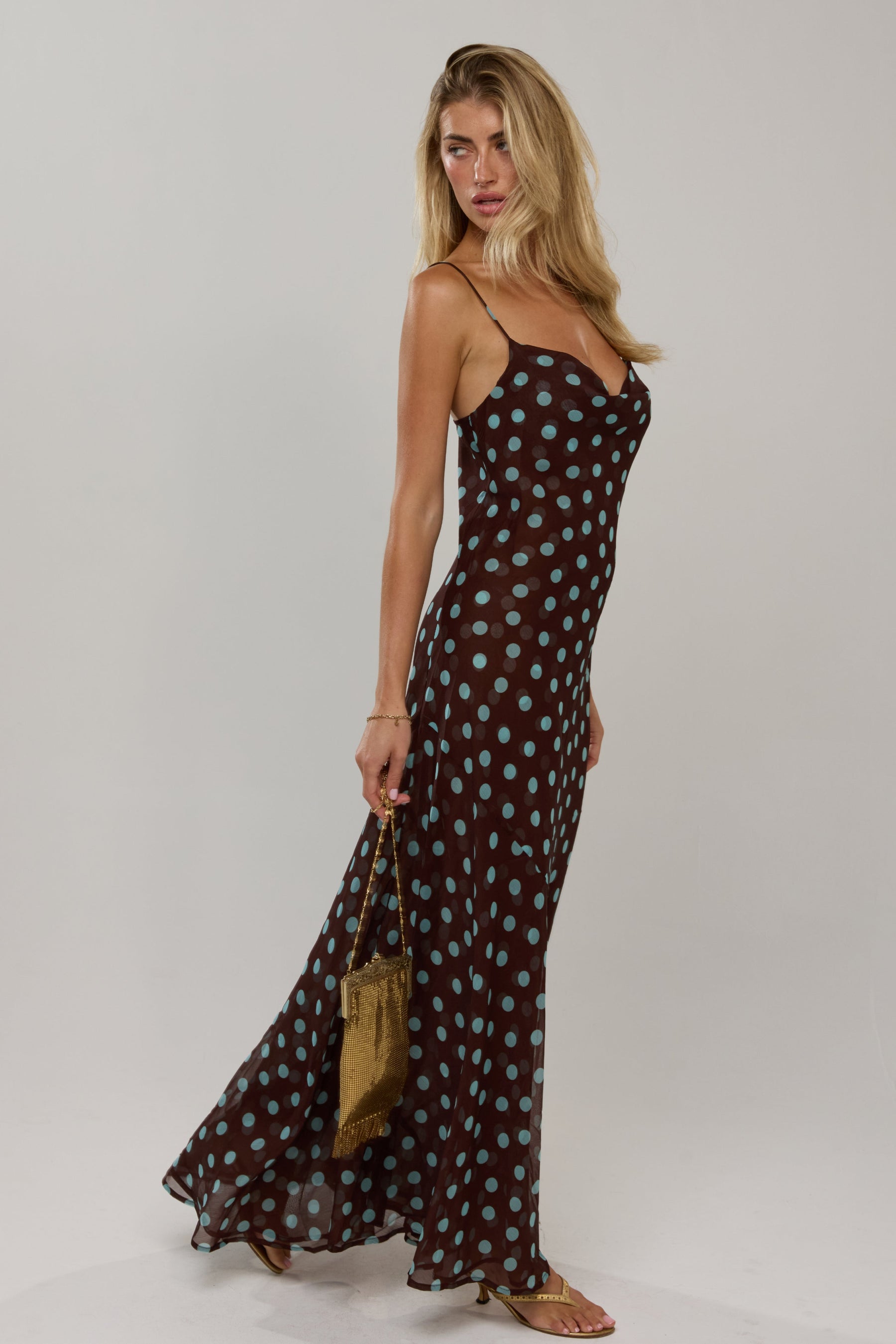 This is an image of Margot in Costa - RESA featuring a model wearing the dress