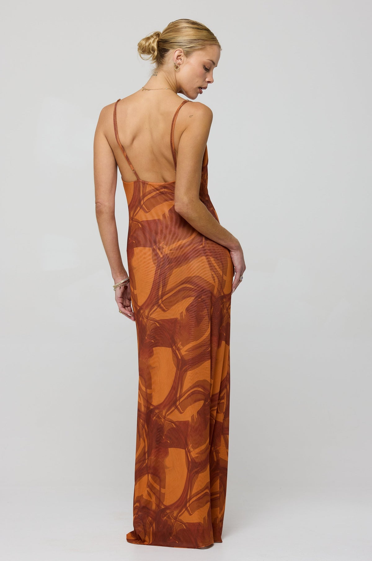 This is an image of Margot Mesh Maxi in Flame - RESA featuring a model wearing the dress
