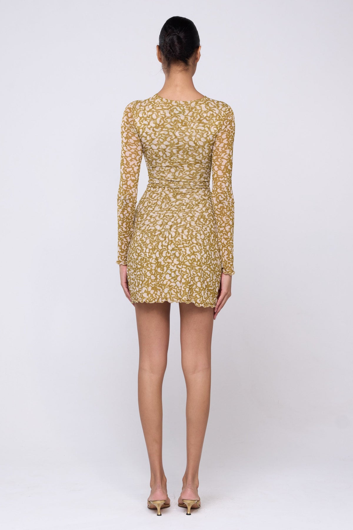 This is an image of Marissa Dress in Fava - Archive - RESA featuring a model wearing the dress